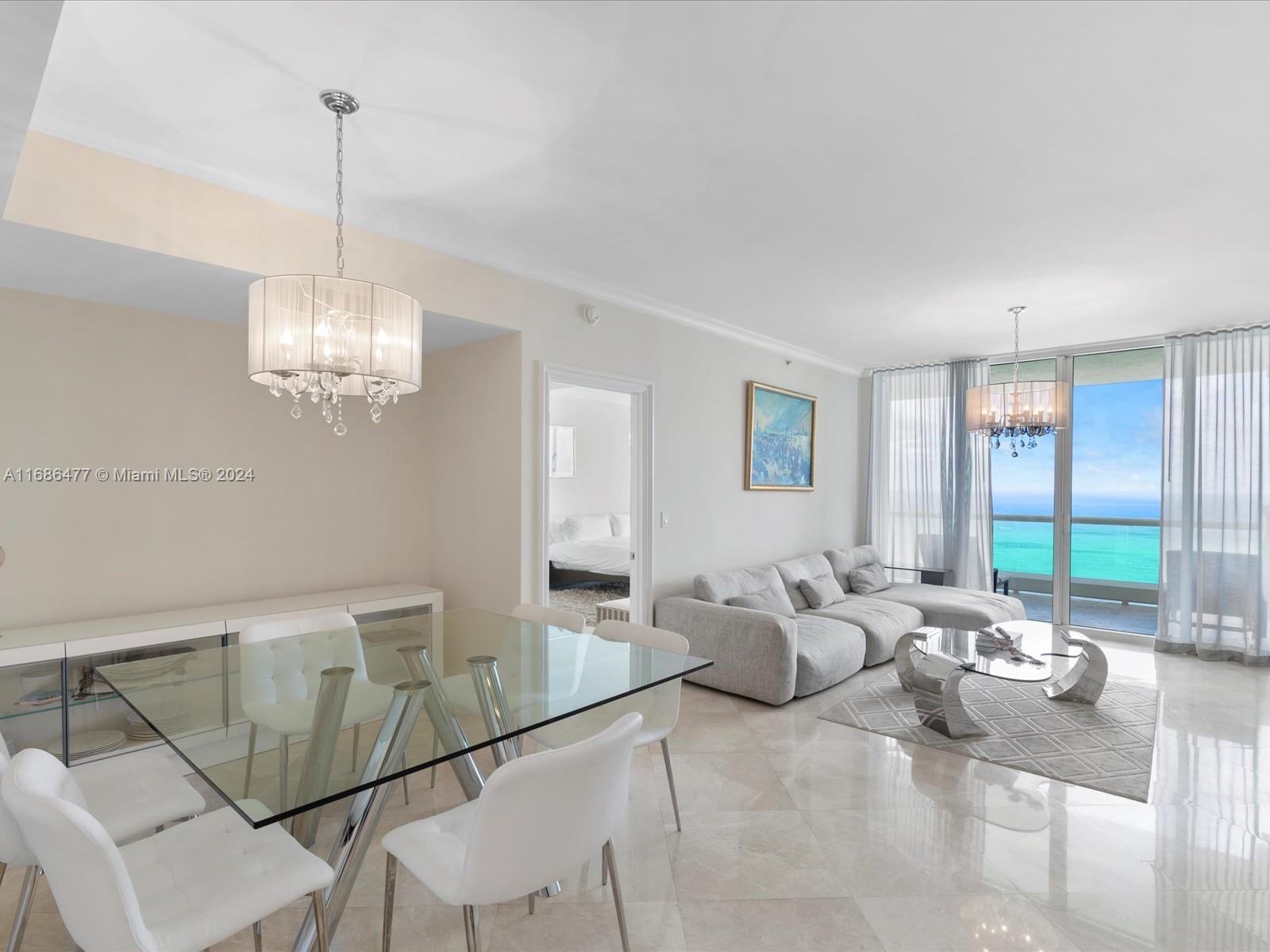 Experience luxury living in this spectacular three-bedroom, three-bathroom oceanfront residence at Acqualina Resort and Spa. Recently renovated, this stunning unit offers magnificent views of the ocean, Intracoastal, and city skyline. The flow-through layout ensures you can enjoy breathtaking vistas from sunrise to sunset. Featuring marble floors throughout, a newly upgraded kitchen, and elegant contemporary décor, this residence is the epitome of sophistication. Acqualina Resort provides a five-star, five-diamond lifestyle with an array of premium amenities, including a world-class gym, four pools, valet service, spa, fine dining restaurants, and a dedicated concierge. Discover the ultimate in luxury living at Acqualina.