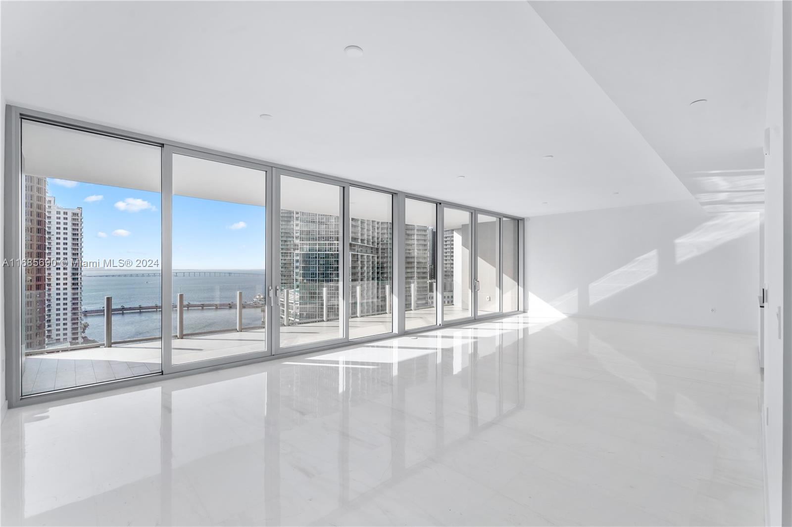 3 bed 3.5 baths flow-through unit at the brand-new Aston Martin Residences in the heart of Miami. A private elevator foyer and double door entry opens to an expansive open great room with seamless connection to one of the largest terraces in the building overlooking Biscayne Bay, the Miami River, and Brickell city skyline. An open-air Bulthaup kitchen, equipped with Gaggenau appliances including full length wine cooler, make entertaining effortless. The expansive primary suite features dual closets, and luxurious bath with water closet, dual sink vanity and soaking tub. Enjoy access to 4 levels of world class amenities including 2-story fitness center, indoor and outdoor pools, men's & women's spa with steam, sauna and jacuzzi, & more! All within walking distance to the best of Miami