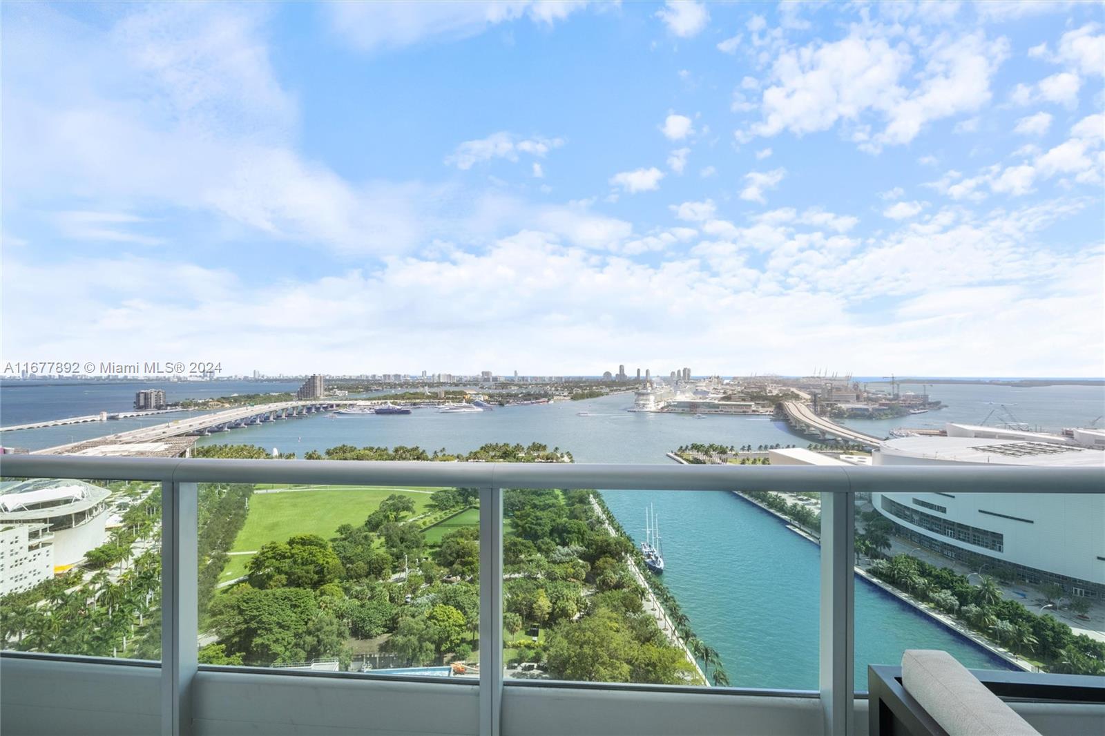 Demand the best? 2709 delivers. This east-to-west flow-through with floor-to-ceiling windows reveal a masterpiece: the endless Atlantic, unobstructed Biscayne Bay, the Miami Beach skyline, Downtown's cityscape and ever-changing sky. This 1,712 sq. ft. condo boasts 10-foot ceilings, new white oak floors and a calming palette. Private entryway, lutron system, custom Italian closets and designer lighting add a touch of refined elegance. Gourmet kitchen is equipped with top-of-the-line Miele and Sub-zero. New AC, water heater and Nest ensure year-round comfort. Beyond, 900 Biscayne Bay offers unparalleled accessibility and luxury with 2 pools, spa, gym, playroom, business center and theatre. Across the street, discover culture and recreation with a park, museums and theatre.