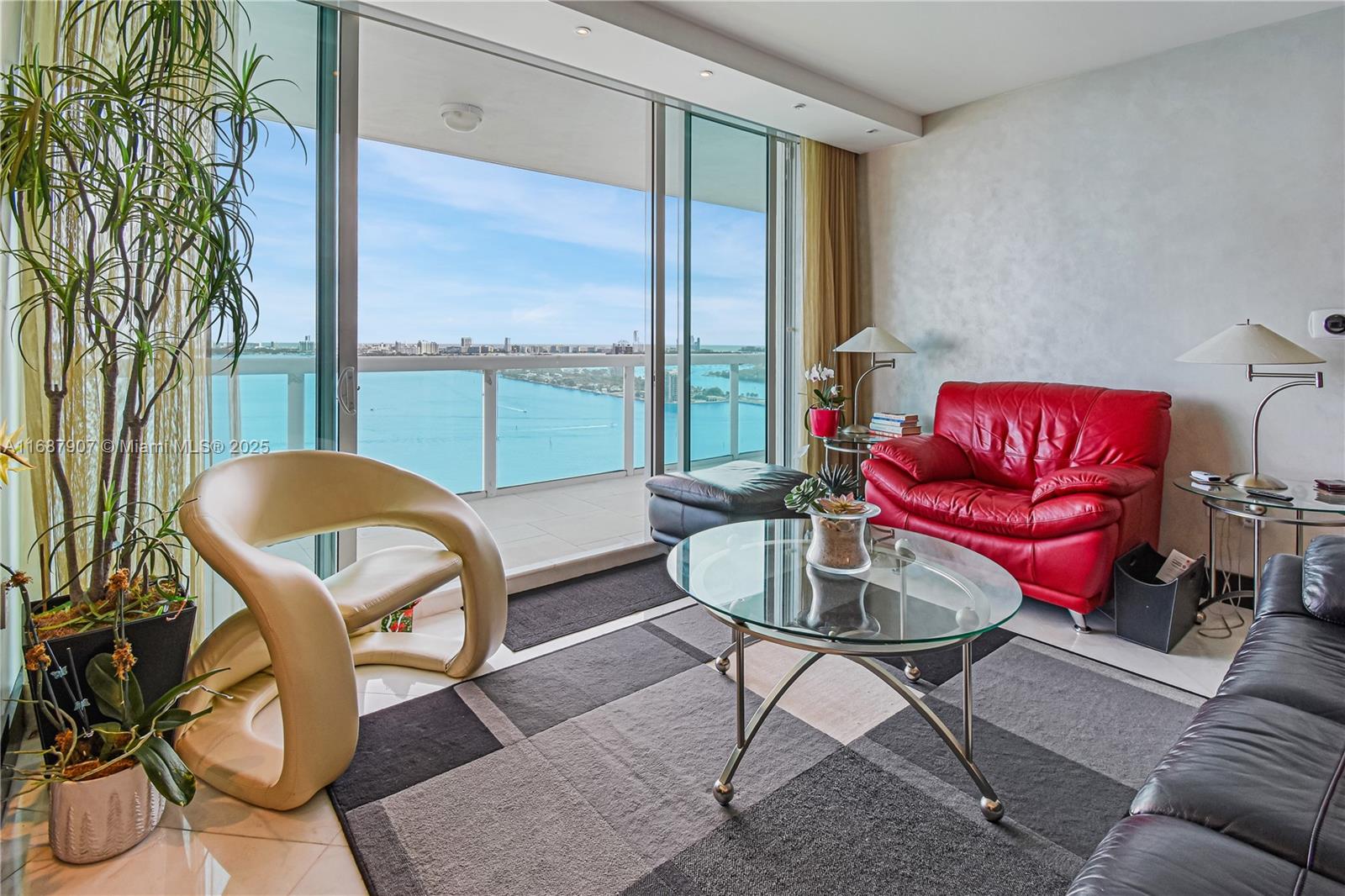 Stunning 2-bedroom, 2-bathroom unit with 1,154 SF of living space and large 232 SF balcony with unobstructed views of Biscayne Bay. This fully renovated, top-of-the-line property features a sleek Poggenpohl kitchen with premium granite countertops and designer Bizzasa finishes throughout the kitchen and bathrooms. The luxurious marble flooring, custom lighting, electric roller shades and matching wood details on baseboards, closets, and bathroom cabinets add an elegant touch to every room. 

Building amenities are in working condition and include a gym, sauna, steam room, hot tub, pool, business center, game room, valet parking, package receiving area, bicycle storage area, concierge, and tastefully decorated common areas. 

Unit will be available on February 1st.