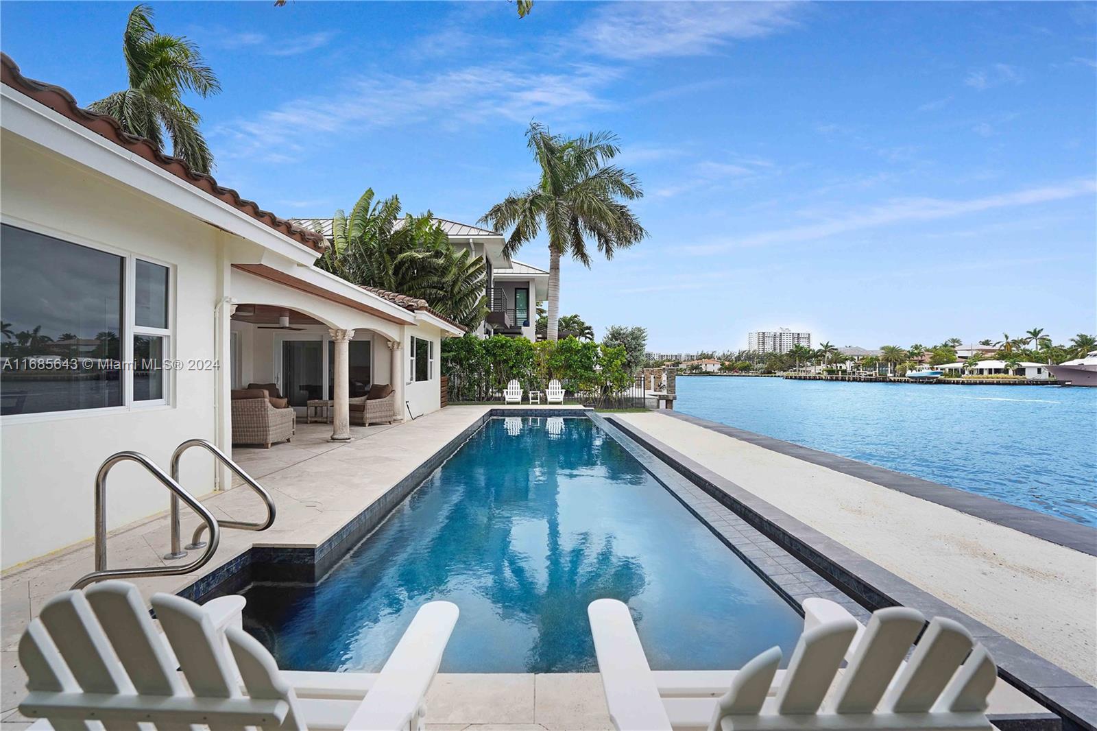 Welcome to your ultimate retreat in sunny Lauderdale By The Sea! This delightful 3-bedroom, 2-bathroom haven offers 1,940 square feet of comfortable living space on a generous 7,837 square foot lot. Imagine lounging by your impressive 50-foot heated pool, perfect for endless relaxation and fun. Nestled along the Intracoastal, this property provides a unique waterfront lifestyle and exciting development opportunities. With a private beach membership included, you can enjoy the sand and surf whenever you please. This home is your gateway to a tranquil coastal lifestyle—don't miss out on making it your own personal paradise! Whether you're entertaining guests or seeking a quiet retreat, this property offers the perfect blend of comfort and luxury for every occasion.