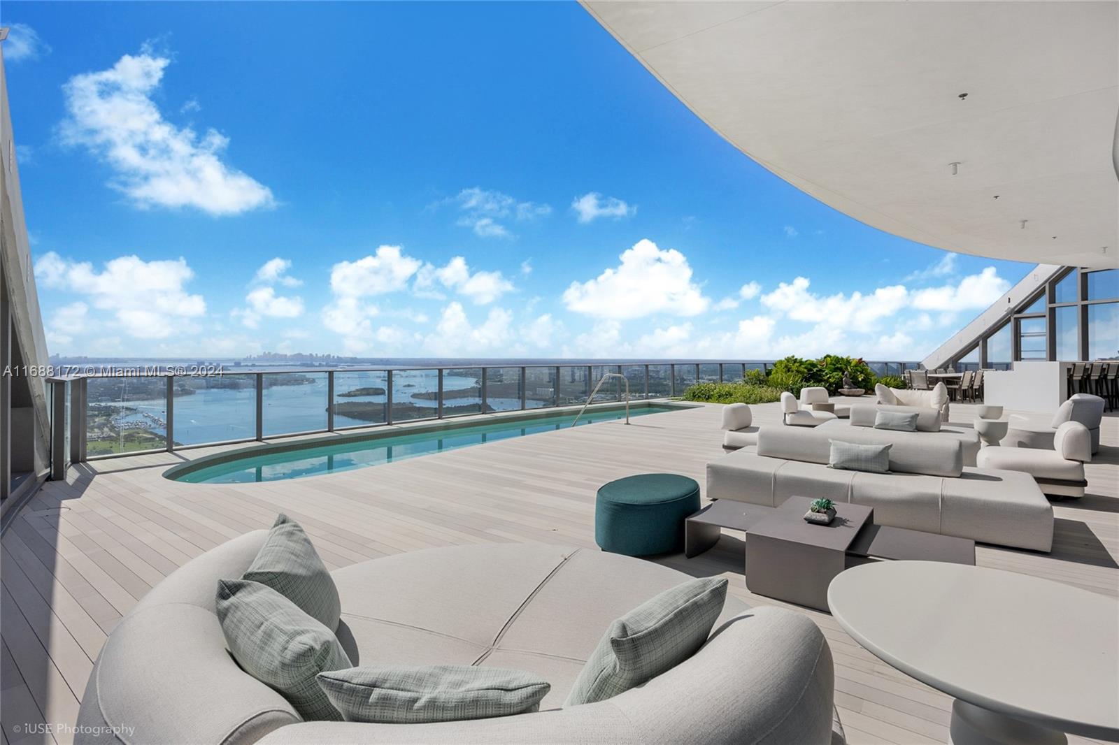 Experience unparalleled luxury in this 5-bedroom, 7.5bath penthouse at the exclusive Ritz-Carlton Residences. This extraordinary home boasts expansive interiors, refined finishes, and an abundance of natural light throughout. Enjoy breathtaking panoramic views from every angle, capturing the cityscape, ocean, and sunsets beyond. The spacious private terrace is an entertainer's dream, complete with a pool and ample lounging areas. Each bedroom is  tranquil retreat, offering en-suite baths and custom closets, while the primary suite features an expansive walk-in closet and spa- inspired bath. This residence also includes access to the Ritz-Carlton premium services and amenities, providing an unmatched lifestyle in the heart of Miami