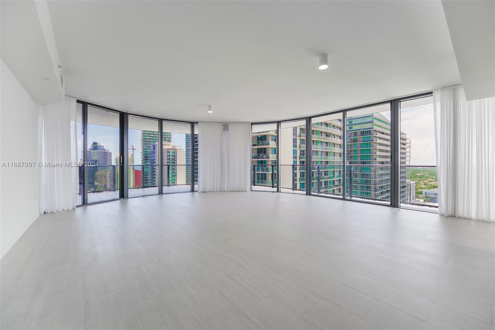 Spectacular upgraded unit at the iconic Brickell Flatiron. Huge best corner unit with 3 bedrooms / 3.5 baths! Top of the line Miele appliances, Nest system thermostat, Italian doors, Glass-enclosed showers, Custom made closets & Window treatments, 9-foot ceiling heights, wrap around balcony with amazing views, premium flooring, STORAGE SPACE, among others! Live & play in this luxury building that offers some of the best amenities in the city: Sky club rooftop at the 64th floor offering sky Pool with 360-degree views of Miami & Biscayne Bay, fitness center with the best views of the city, & Wellness Center & Spa. Flatiron Club at 18th & 17th floors offering a private movie theater, outdoor lap pool, children's playroom, social lounge room, billiards room, & concierge service.