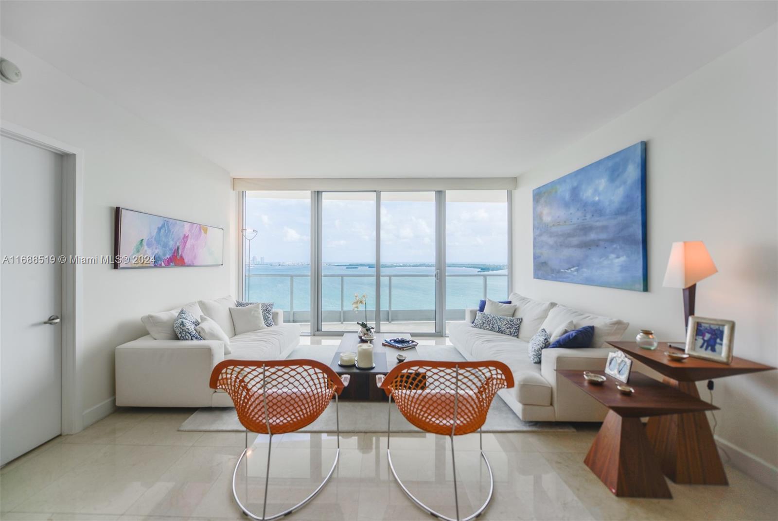 Spectacular & fully FURNISHED 2 bedroom, 3 bathrooms plus a den in the iconic Jade Brickell building. Offers breathtaking views from a spacious terrace. Featuring 1,730 SF of open living space, the unit includes a private elevator, gourmet kitchen with high-end appliances, and a luxurious primary suite with direct bay views, walk-in closets, and a marble bathroom with Jacuzzi tub. Enjoy 5-star amenities including a fitness center, spa, waterfront pool, business center, and penthouse-level community room. Full-service concierge and valet make this a true five-star experience.