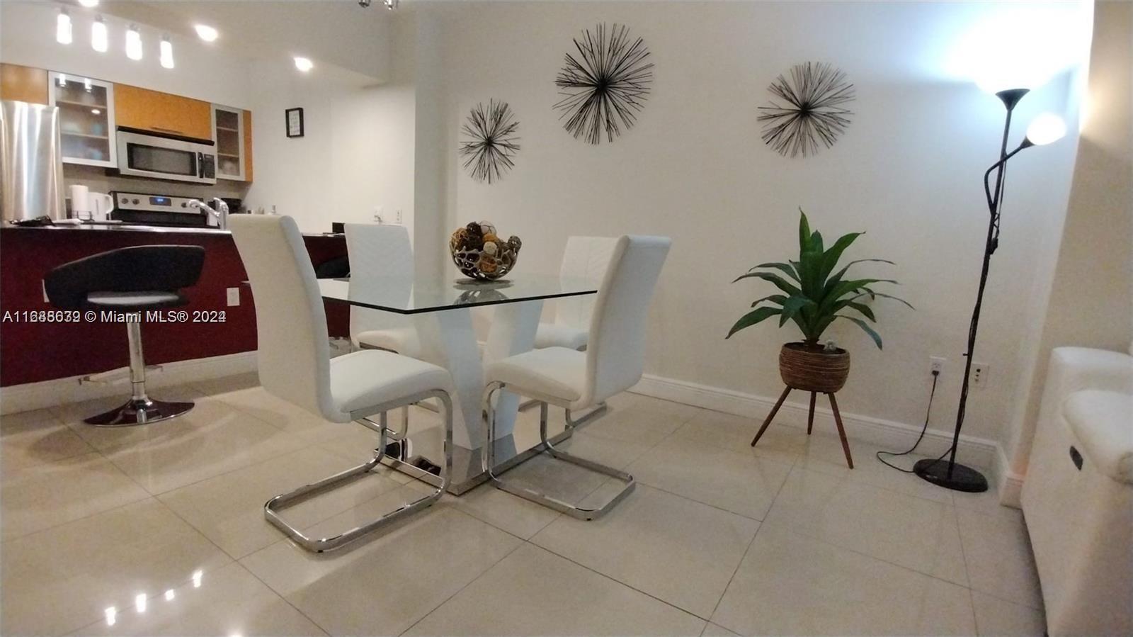 This stunning 1-bedroom, 1-bathroom condo in Miami offers a bright, airy living space with porcelain floors throughout. Enjoy abundant natural light and breathtaking views of Miami Bay and the city skyline from your private balcony. The unit features a convenient washer and dryer, and all utilities, including water, power, and Wi-Fi, are included. Ideally located near shops, restaurants, banks, and major highways, this condo offers the perfect blend of comfort and convenience for urban living in Miami.