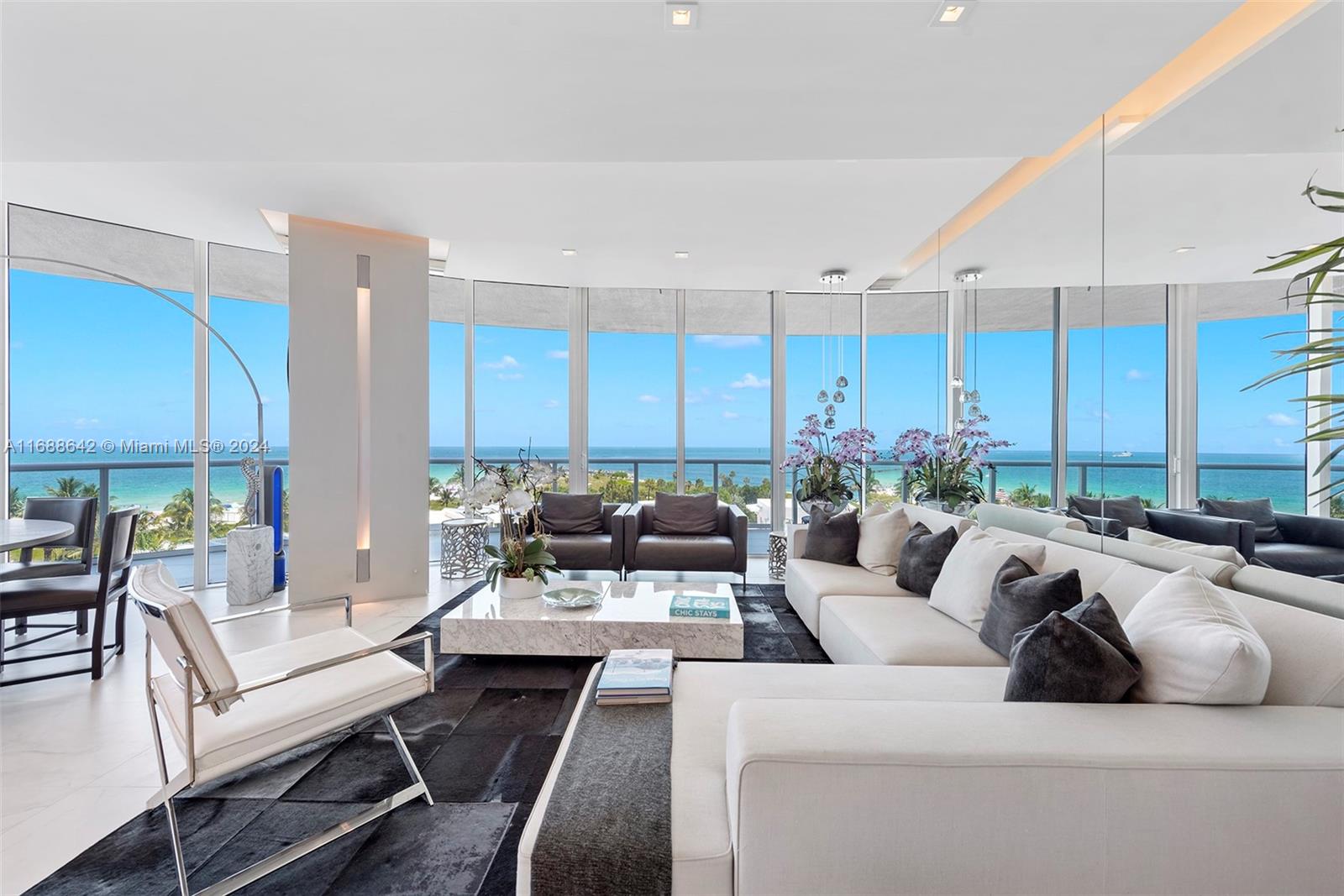 3Bed+staff 4.5bth. Iconic residence at Continuum presents an opportunity to acquire the only SE corner available. Incredible panoramas will take your breath away as you enter through a grand private foyer. Nestled above the Atlantic at the southernmost tip of Miami Beach, enjoy the outdoor wonders on an enormous 715 SF wrap-around terrace. Bask in the best views of Fisher Island, parading cruise ships, S.Pointe Park, and the Miami Beach coastline. Principal suite offers custom closets, sitting lounge, oversized shower w/solid basalt marble bench. Kitchen features  Calacatta Gold marble isle,Miele+Subzero, wine vault+coffe bar. LutronLED/shades. Irreplaceable 13acre private oasis offers 3level gym/medspa,3 pools,cold plundges,beach butler,3Har-Tru tennis,restaurant,concierge,biometric entry