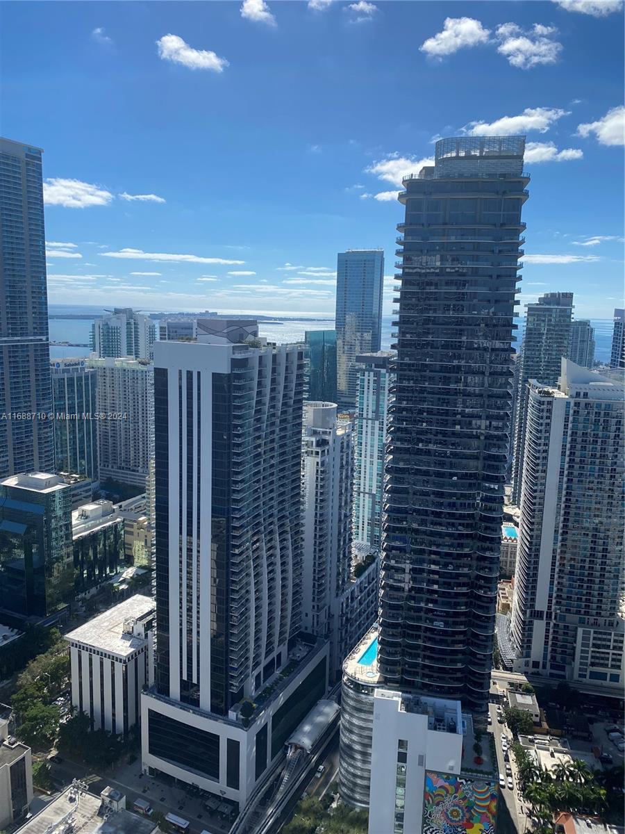 Stunning high floor unit  with bay views  at the famous SLS LUX .Features 2 bedrooms/2 and half bathrooms plus den ,Italian tiles ,marble throughout bathrooms, high end appliances .Large terrace overlooking to bay and Miami skyline.SLS LUX is one of the most luxurious buildings in Brickell with exquisite amenities  such ,  expansive two pools (9th & 57th floor) w/ cabanas & poolside bar, BBQ area, tennis court, gym, spa  and more.Steps from Brickell city center.One parking spot