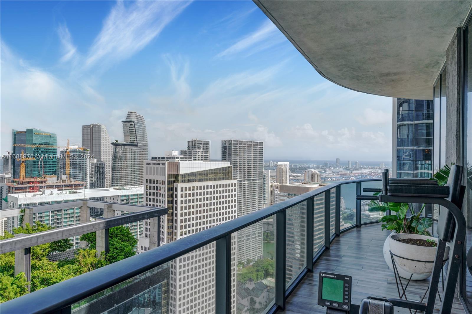 Discover this exceptional 4-bedroom, 4.5-bath corner unit at SLS LUX located in the heart of Brickell, a unique residence crafted from two original units. With an expansive open floor plan, floor-to-ceiling glass walls, and wraparound balcony, this unit offers stunning views of the city skyline and bay. Featuring two master suites and generous living spaces, it balances elegance and practicality. Designed by Arquitectonica and with interiors by Yabu Pushelberg, the unit includes a PRIVATE elevator with biometric and facial recognition access for enhanced security. Equipped with Smart Home technology, high-end Subzero and Wolf appliances, Italkraft cabinetry, built-in closets, and a spacious laundry room, it’s designed for seamless modern living.