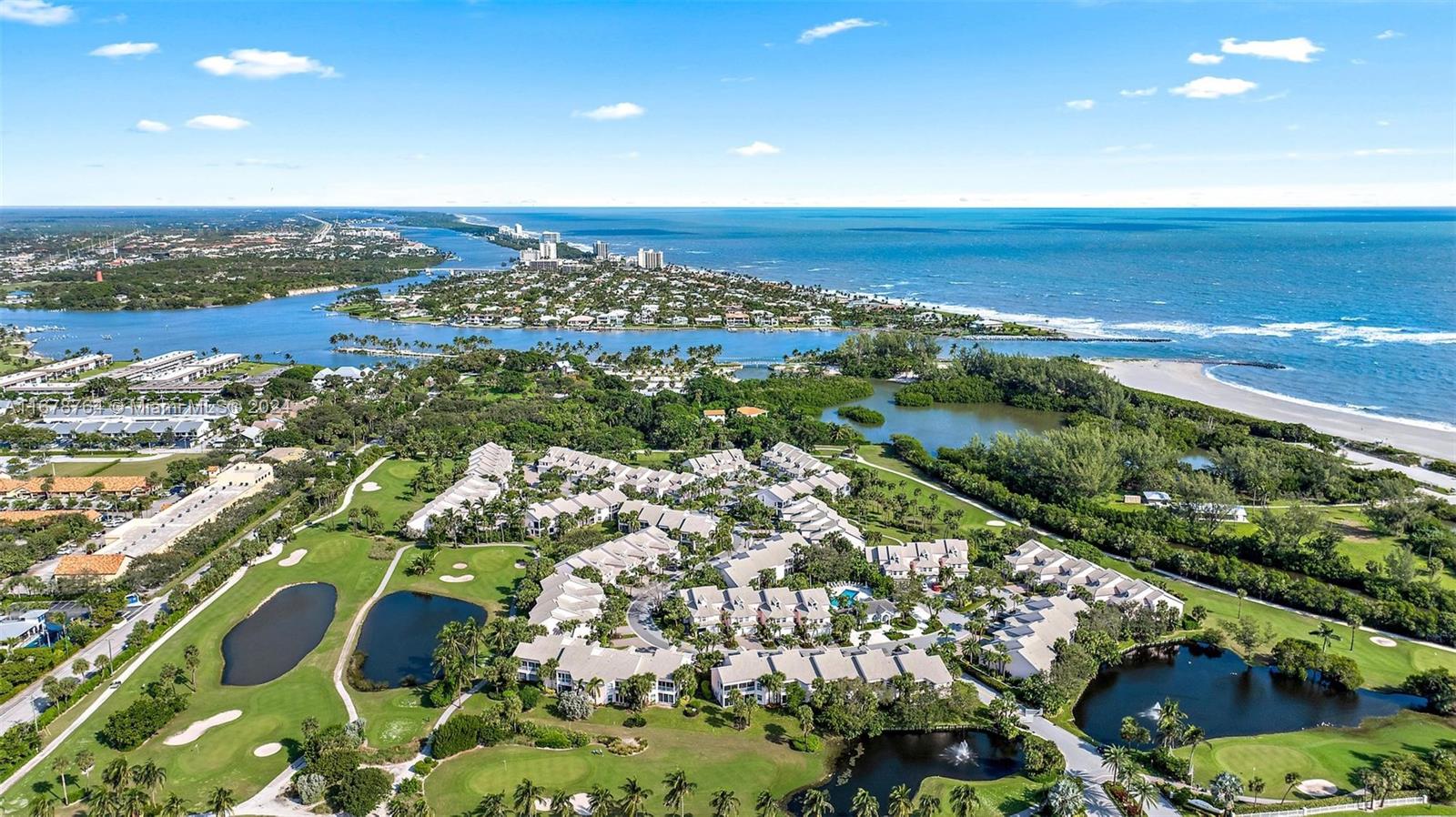 Welcome to 3905 Fairway Drive N, a stunning property located in one of Jupiter's most desirable, gated, beachside communities, The Estuary. This beautifully renovated 2-bedroom, 2.1-bathroom home has a beautiful enclosed patio where you will enjoy the tranquil sounds of the ocean, eastern exposure of the back 9 of the Jupiter Dunes golf course, and water views. A short walk to Jupiter Inlet beach and there's private access to Dubois Park and the estuary is a stone's throw away. Step inside to discover a light-filled living area with elegant tile flooring. The kitchen features granite countertops and new LG stainless steel appliances. The first floor tranquil master suite features a walk-in closet with custom built-ins, new vinyl flooring, and an ensuite bathroom with a new vanity and a