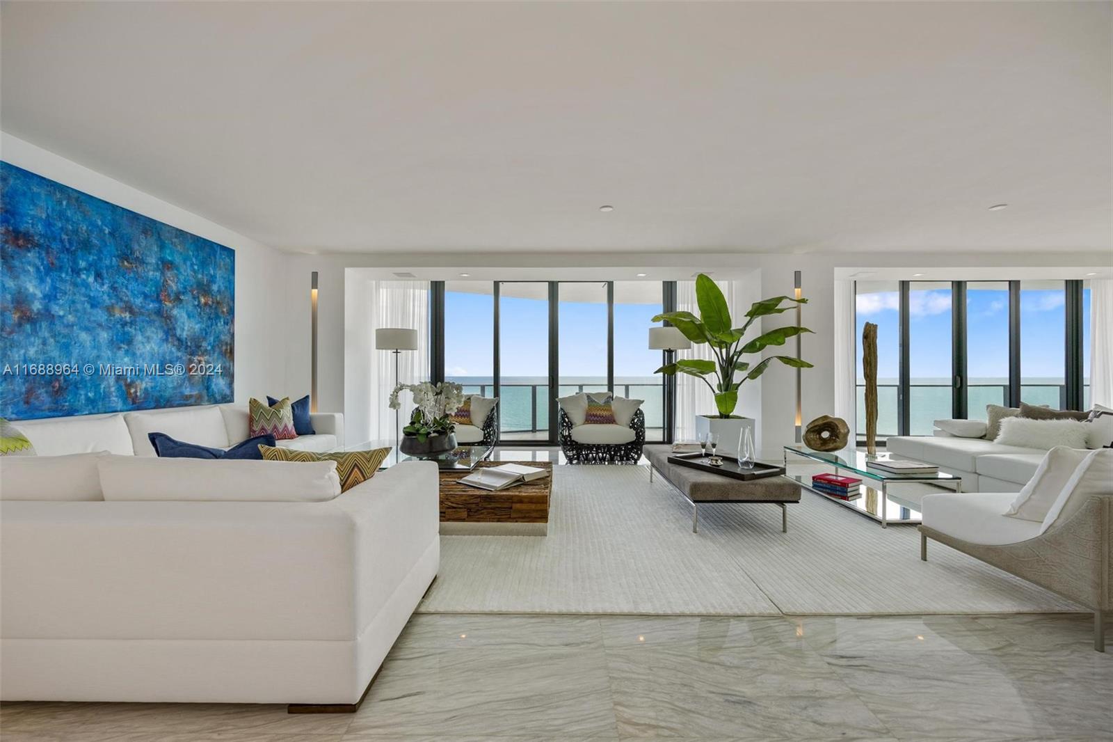 Move-in ready, full floor residence with 360-degree views. Boutique oceanfront building, private and secure. Must-see.