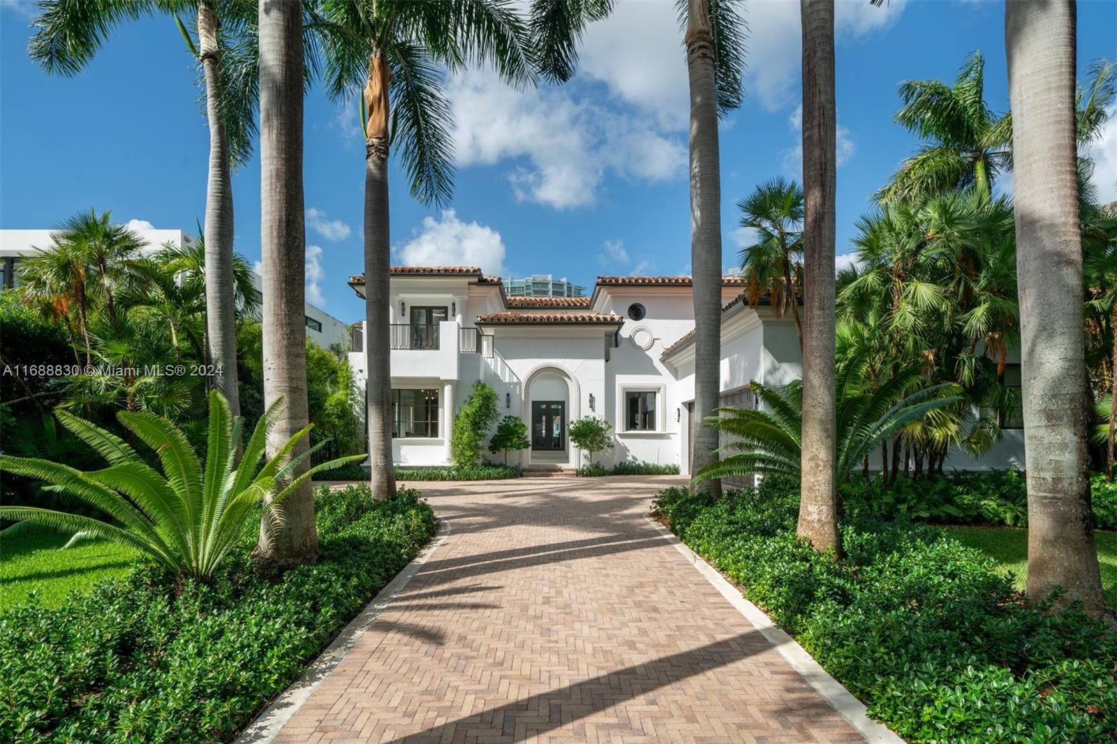 Experience timeless elegance in this beautifully renovated Italian-inspired villa, nestled along 85 feet of serene Intracoastal waters in Golden Beach. This expansive 6-bedroom, 5.5-bath home seamlessly blends modern sophistication with classic charm. The main level is graced with oversized travertine designed porcelain, leading to a spacious chef’s kitchen featuring panda marble and Sub-Zero/Wolf appliances. Upstairs, rich wood floors guide you to an oversized primary suite with sitting area and dual closets. Staged by Artefacto and thoughtfully designed by Carolina Gutierrez, this Mediterranean Modern villa draws architectural inspiration from Palm Beach and Santa Monica, surrounded by lush, landscaping that creates an idyllic, serene escape—a true testament to refined, luxurious living.