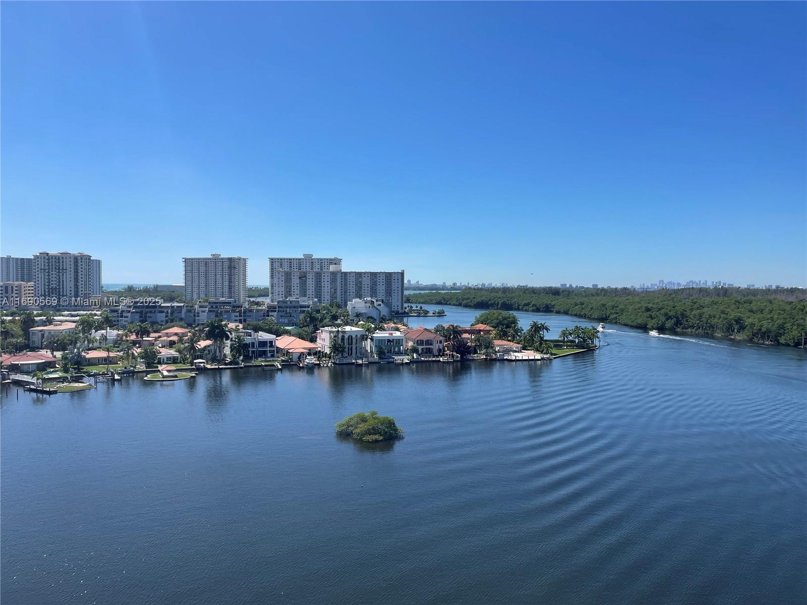 Close to the beach, cafes & restaurants. 400 Sunny Isles is a full-service building with a private marina, boat storage, and flow through pool deck w/ tennis courts. Unit 1002 is the best split-floor-plan with an expansive large terrace (accessible from living room and bedrooms). A peaceful unit with incredible unobstructed views of the Intracoastal, Ocean and Oleta Park. This large 2 bedroom, 3 full baths plus an enclosed DEN that could be used as a 3rd bedroom or home office. This large, bright and spacious unit, facing south-west, features high impact hurricane sliding glass doors, ceramic white floors, built in closets and window shades. Comes with 2 covered assigned parking spaces. Easy to show!