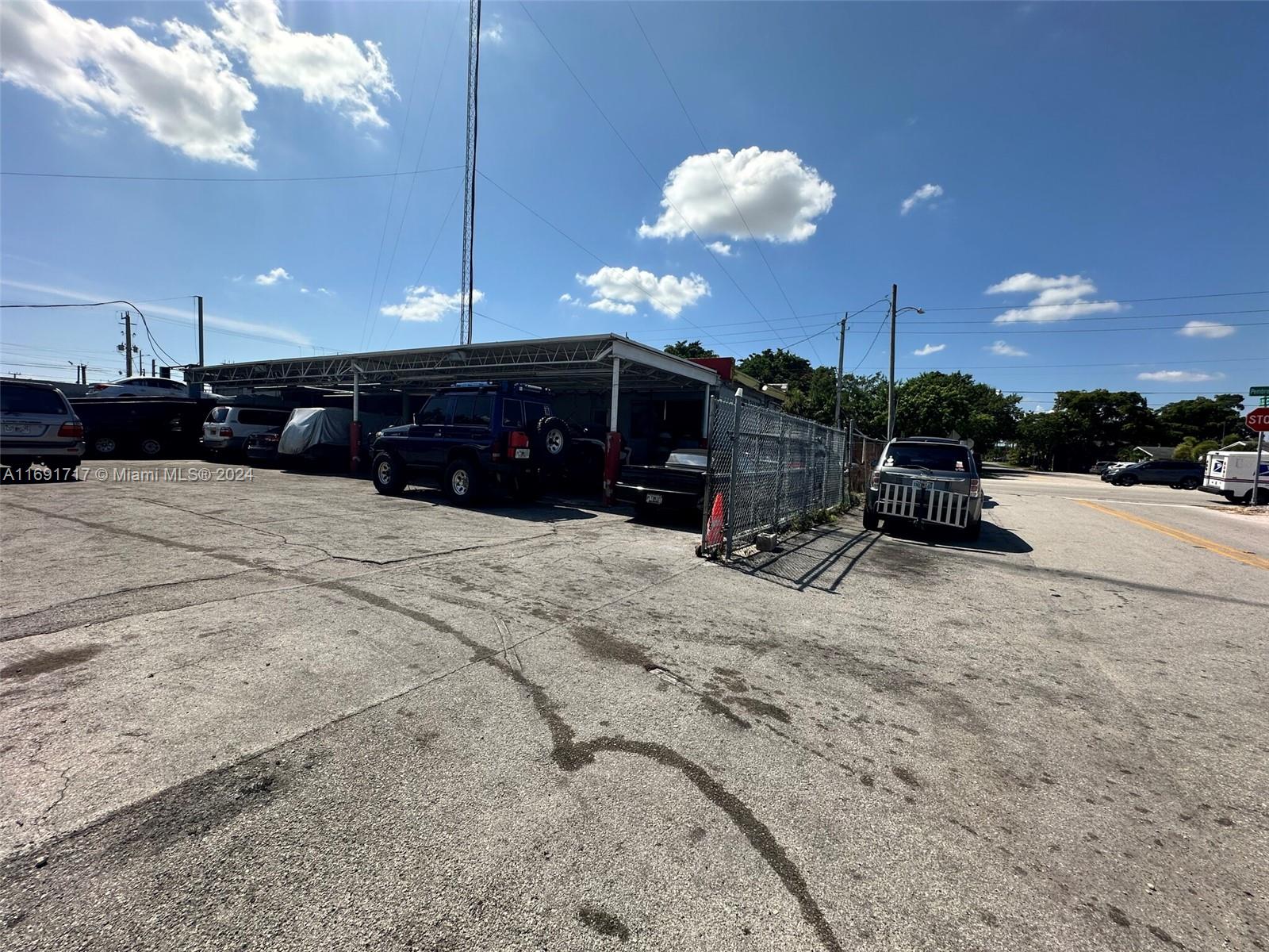 Rare opportunity to lease an automotive sales and repair shop conveniently located on Pembroke Rd, strategically positioned to capture the attention of over 40,500 passing cars daily. The two buildings combined offer 3,446 SF, with a large 21,195 SF lot and ample parking for customers. The auto sales building includes a 672 SF office and an enclosed warehouse of approximately 650 SF, while the open garage service area spans 1,874 SF. The auto repair building covers 2,124 SF, featuring a front overhang and a customer point-of-sale area, with an office located at the rear of the building. This property is ideal for a full range of automotive services, including auto sales, service, and repairs.