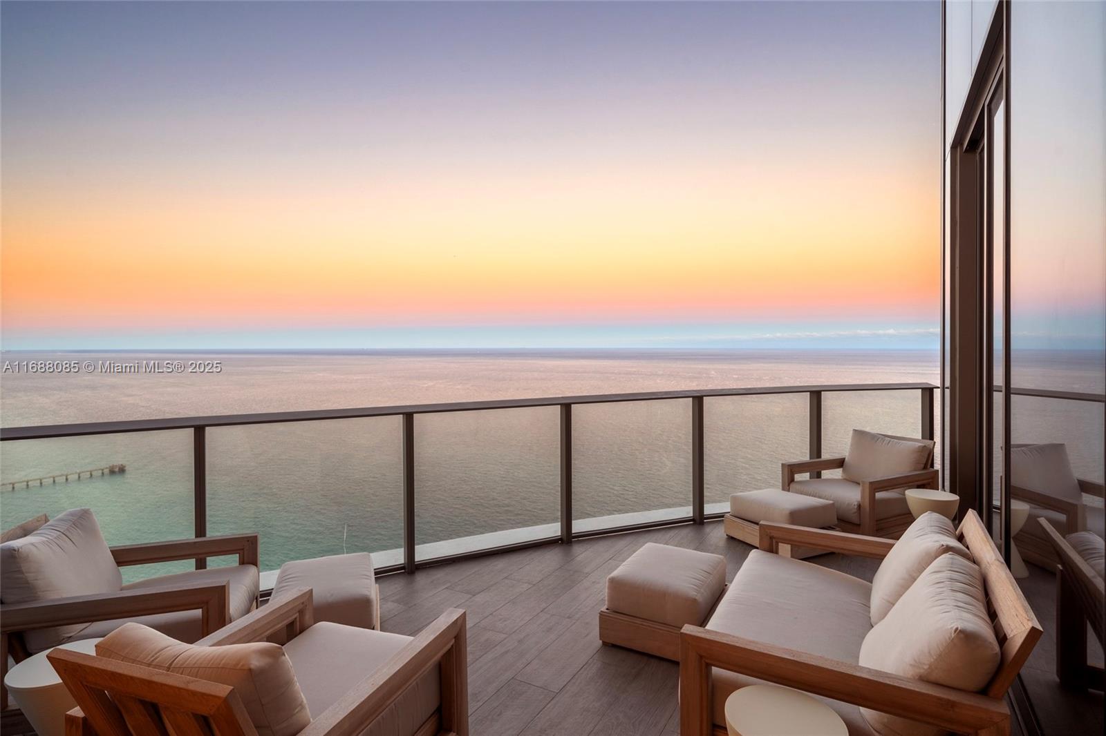 Rarely Available soaring on the 48th Floor, this Unit has been Exquisitely fully remodeled by Interior Designer Graciela Dayan at the prestigious Ritz Carlton Sunny Isles w/ No expense spared. The unit features 3 bed / 4.5 bath,14 ft Cathedral ceilings & expansive terraces. Breathtaking unobstructed panoramic ocean & city views from sunrise to sunset through 14 ft floor to ceiling windows. Every detail exudes elegance, from the custom Italian millwork & white oak herringbone wood floors to the striking Calacatta Viola marble, custom fireplace & Gaggenau appliances. The Ritz's signature amenities include: Private Elevator, 24hr Concierge, valet, spa, fitness center, beach/pool svc, 2 pools & restaurant. Luxury Living at its finest.