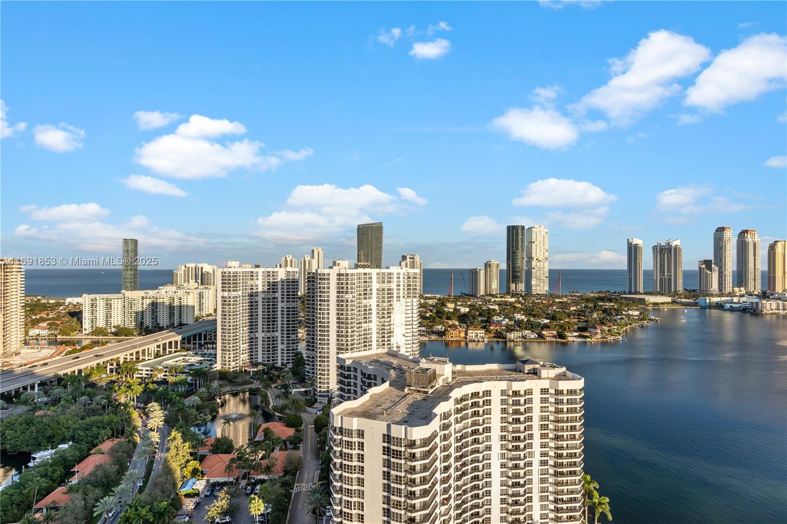 Welcome to Mystic Pointe 500 in Aventura! This stunning lower penthouse features two spacious bedrooms, two bathrooms, and 1,447 square feet of beautifully designed living space. Enjoy breathtaking Intracoastal and ocean views from every angle, thanks to large windows that bathe the unit in natural light. The open layout includes a modern kitchen and an expansive living area, making it perfect for relaxation or entertaining. This residence is located in a luxury building with top-tier amenities—such as a pool, gym, and secure access—and offers a perfect blend of elegance, comfort, and an unbeatable location. Don’t miss your chance to experience this true gem in Aventura!