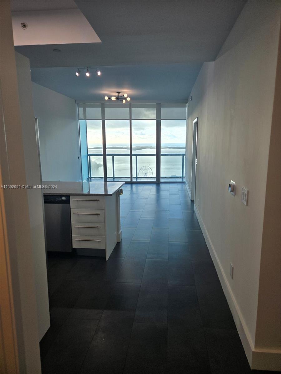 1 Bedroom, 1.5 Bathroom plus Den. 44th floor with amazing Bay view, modern kitchen, custom walk-in closet, washer and dryer inside the unit, 1 assigned parking space on the 6th floor. Amenities include 2 pools, beach volley field, mini golf field, barbecue area, business center, party room, jacuzzi and gym. Walking distance from Bayside shops, Arena, Bayfront Park, Science and Art Museum, Publix.