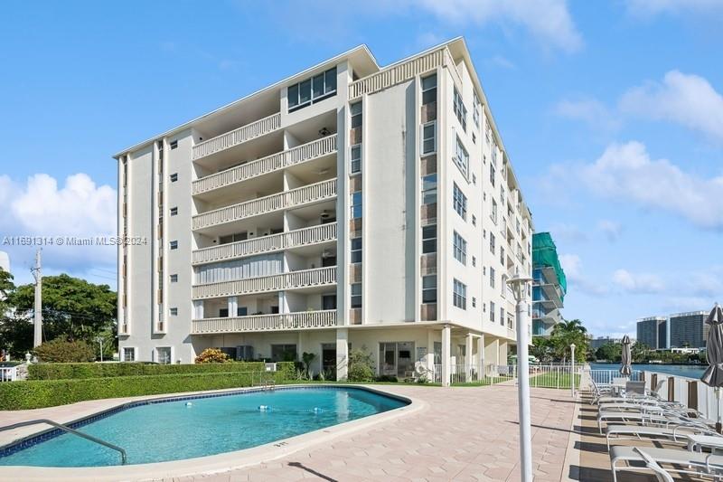 Looking for a large 2BR/2BA condo in an ideal location in  the quiet village of Bay Harbor Islands?  Then this totally remodeled. 1576sf condo in this small boutique building could be your perfect choice.  This move-in ready condo features tile floors throughout, a large living room/dining room area,  an open kitchen with breakfast bar, split bedrooms with baths ensuite and ample closets.  Enjoy the building's waterfront pool, community room, exercise room and the newly remodeled lobby.  This prime location is within walking distance to the main avenues, great A rated schools, excellent dining establishments,  the shops at Bal Harbour, the beach and numerous houses of worship.  A true find!