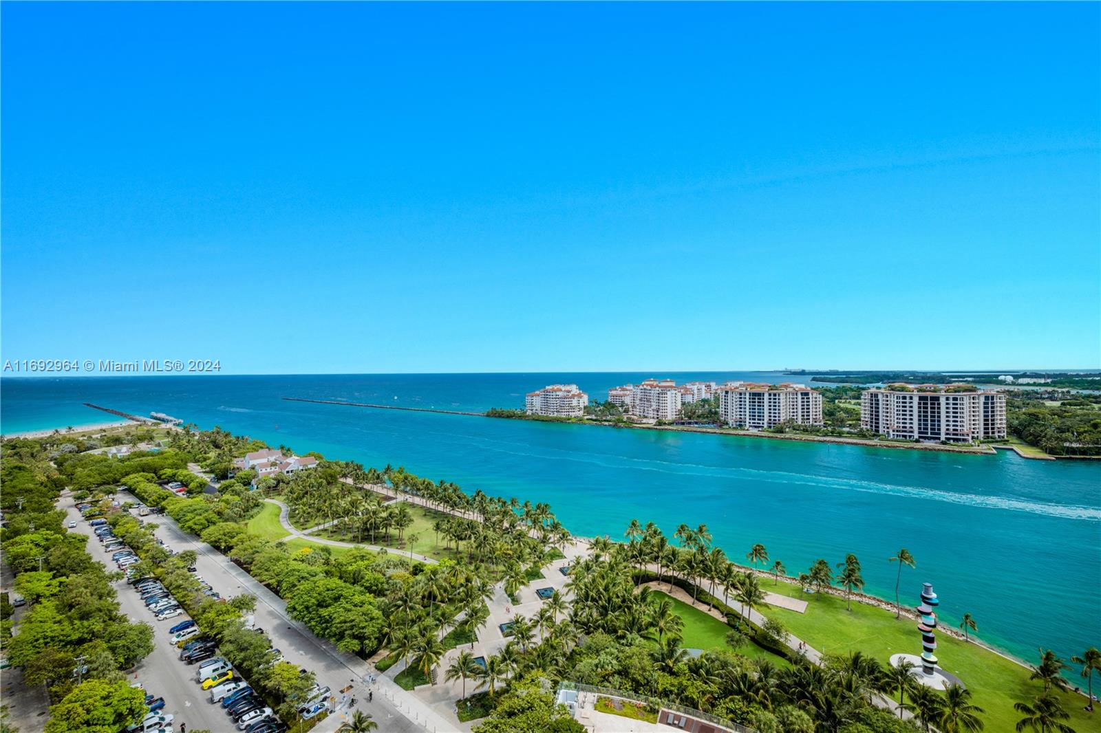 ENJOY UNOBSTRUCTED PANORAMIC SUNRISE & SUNSET VIEWS OVER THE OCEAN FROM THIS LUXURIOUS 3-BEDROOM RESIDENCE AT THE ULTRA-EXCLUSIVE APOGEE! Private Elevator Foyer Leads into a Flow-thru Living Area w/ Minimalist Ambiance w/ Mirror Accent Wall, Limestone Floors & 10-FT Ceilings. 3,103 Interior SF + 1,030 SF 11-FT Deep Terraces. Summer Kitchen w/ Ocean & City of Miami Views. 3 Beds + 3.5 Baths w/ Oak Floors & 8-FT Mahogany Doors. Light Oak Chef's Kitchen w/ Miele & SubZero Appliances + Gas Range. Primary Suite w/ Walk-in Closet. Soak in the Bay Views from Your Jacuzzi Bathtub + Rain Shower & Floating Double Vanity. Linear Diffusors, Recessed Lighting, Automated Shades. Valet + Private Air-Conditioned 2+ Car Garage. Apogee Features a Resort-Style Pool, Full-Service Concierge, 24-Hr Valet + Gym.