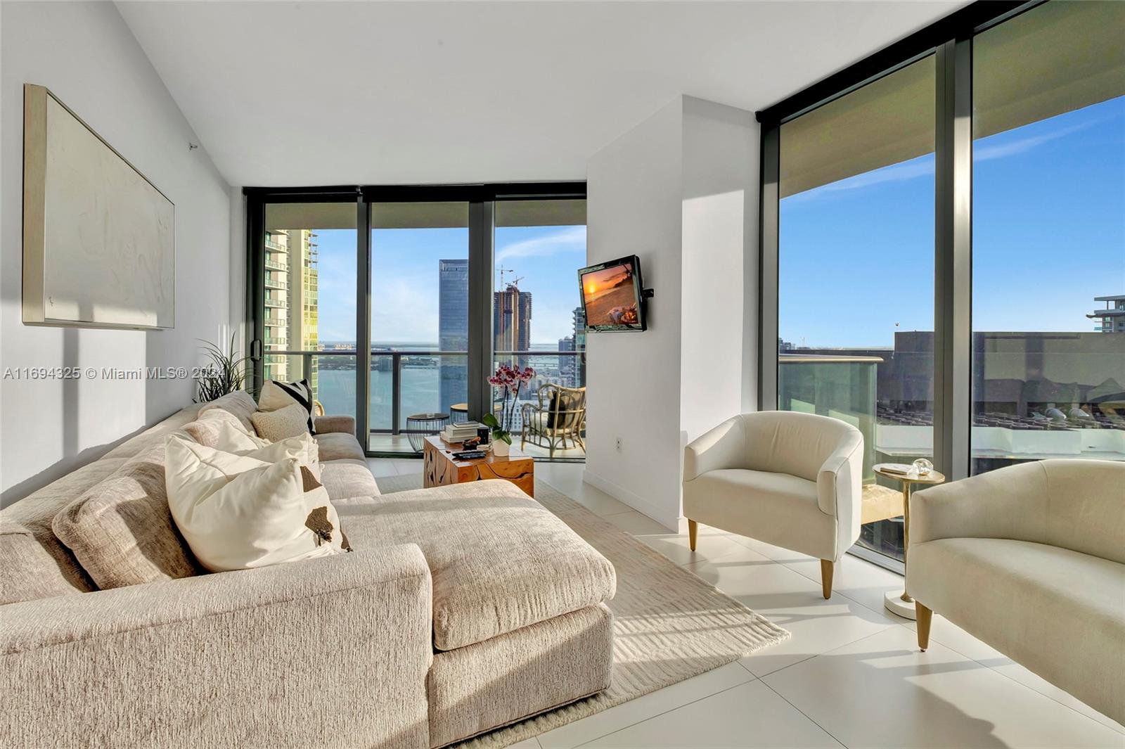 Welcome to your luxurious slice of paradise in the prestigious Edgewater neighborhood, where urban sophistication meets serene waterfront living. This exquisite corner unit condo, located in a sought-after high-rise building, boasts unparalleled views of the shimmering city skyline and tranquil bay waters. This condo is a true gem, offering the perfect blend of elegance, comfort, and convenience. As you step into this sanctuary in the sky, you are immediately greeted by an abundance of natural light that streams in through the expansive floor to ceiling windows, illuminating the finely appointed interiors and highlighting the meticulous attention to detail throughout the space. Contact us to schedule viewing and experience the pinnacle of upscale urban lifestyle. 30 Day rentals available