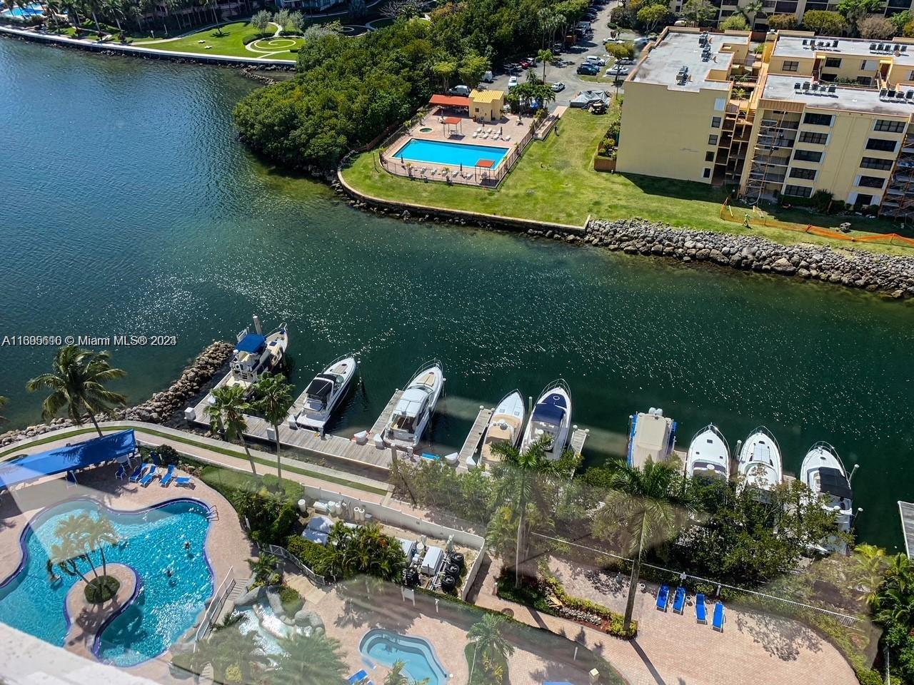 Tower 500 / Beautiful unit in Mystic Pointe Tower 500 / Aventura / 2 Beds / 2 Baths / 1,091 sq. ft. of living area / Gorgeous Ocean & Intracoastal views / Split floor plan / 24-hr lobby attended / Building Features: climatized pool fronting the Intracoastal, spa, tennis/pickleball courts, beautiful landscaping/fountains/valet parking, marina, boat slip, fitness center, nail & hair salon, restaurant and MUCH MORE! Stainless steel appliances, dishwasher, microwave, refrigerator, stackable washer/dryer, finished ceiling (no popcorn ceiling), hardwood floors, window shades, a clean and cozy unit. Mystic Pointe Tower 500 is a short distance to the Aventura Mall and a short drive to Sunny Isles Beach.