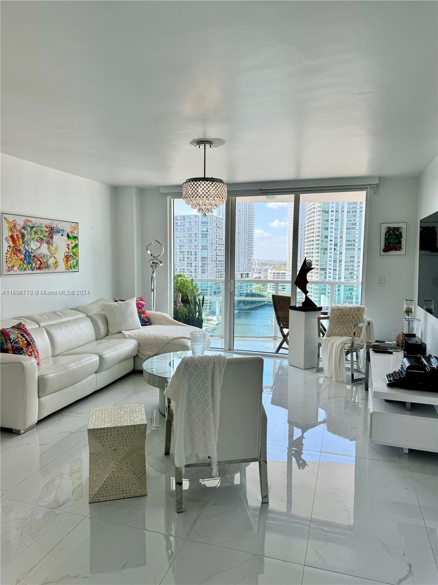 **Furnished **Luxurious 1 Bed/1 Bath in the Heart of Brickell. Enjoy beautiful sunsets from this fully furnished & upgraded apartment, with decorator touches. Large flat screen TV, custom closets. Tiled throughout, Modern Elegant Kitchen, S/S appliances, remodeled bathroom with a relaxing rain shower head, washer/dryer & assigned parking. Full service building, with an incredible location! 2 blocks to Brickell City Center restaurants & shops, walking distance to Mary Brickell Village, Whole Foods & more. Amazing amenities include 2 Pools, Jacuzzi, multi level fitness Center, spa, concierge, valet, clubroom, and business center.  Must See Unit. Vacant Easy to show! Unit can be rented for minimum of 6 months. Includes Electricity, high speed internet and Cable.