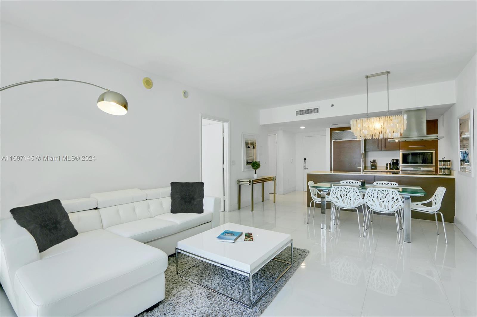 NO SUBLEASING, NO AIRBNB. Fully furnished and beautifully decorated unit. Enjoy the views of Brickell, Miami River and City Skyline from your balcony. This spacious, modern unit features 24X24 Porcelain floors, walk in closet, granite counters and stainless-steel appliances. Exclusive Resort Style building and top of the line amenities! Water, internet, and basic cable are included in the rent. Amenities include a 5-star SPA, largest infinity pool in Miami, great fitness center, free yoga, Pilates, and spinning classes. 24-hour Concierge and Valet parking. Available minimum 6 months.