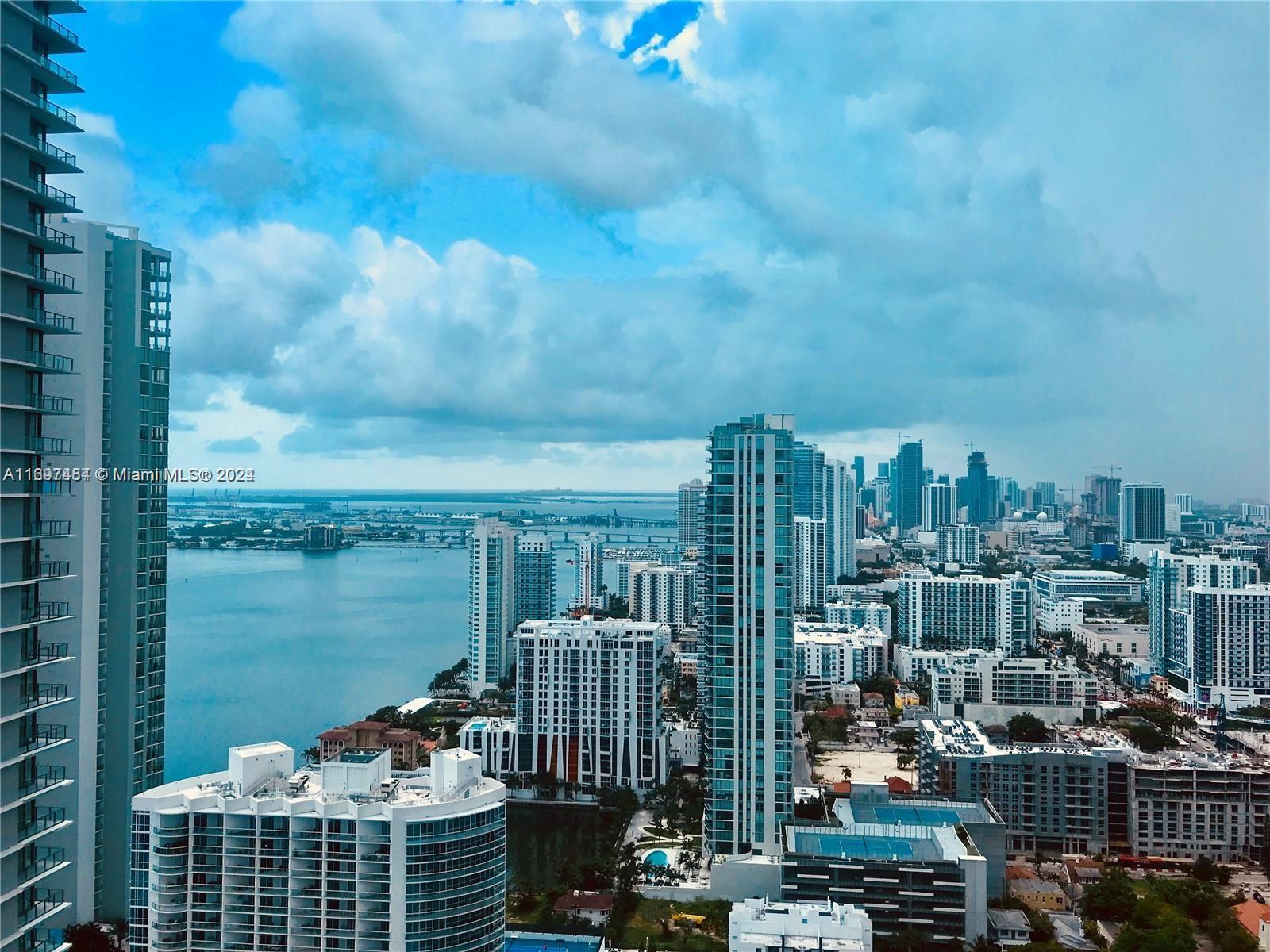 Spectacular Corner Unit with Bay & City Views – Live at the Heart of Miami! Discover unparalleled creative and relaxed luxury in this stunning corner unit located in the vibrant Revive Paraiso District, Breathtaking bay and city views with spectacular sunsets. This 2-2+DEN features a wraparound balcony and floor-to-ceiling impact windows that fill the space with natural light.
sleek ceramic floors, custom-dressed closets. In-unit washer and dryer. First-class amenities: Rooftop pool w/panoramic views,Tennis and basketball courts, Gym-Spa, Children’s room
10 minutes to Miami Beach, 5 min to Wynwood, Midtown, Design District and the Arts District. Easy access to major highways.
Tenant-occupied till January 2026. use Showing Assist.
Don’t miss to live where luxury meets convenience.