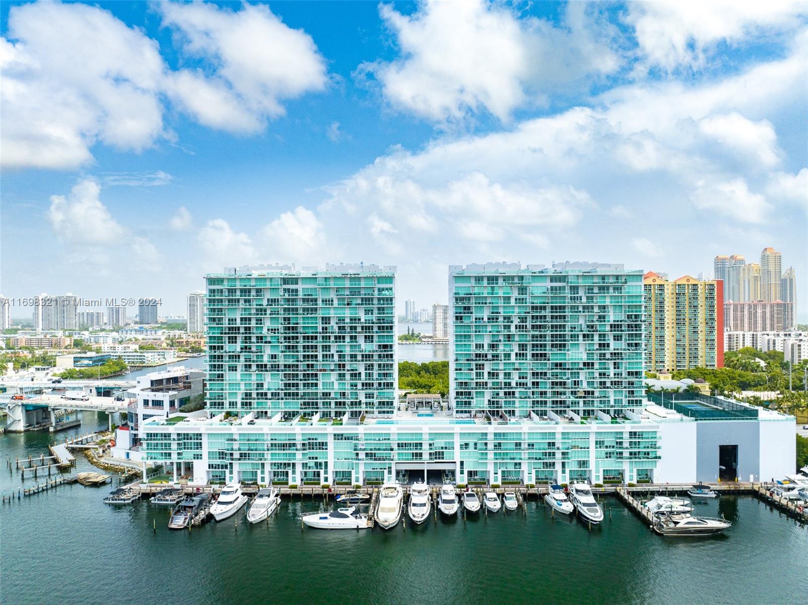 Indulge in breathtaking sunsets and panoramic vistas of the bay, Intracoastal Waterway, Oleta River State Park, and Haulover Park. This one-of-a-kind residence is just steps from the beach, nestled in one of Sunny Isles Beach's newest and most sought-after luxury buildings. The partially furnished, spacious 3-bedroom, 3-bath home features a flow-through floor plan, offering the comfort and feel of a single-family home. It is designed for a luxurious lifestyle and boasts installed custom closets, blinds, and access to world-class amenities: a spa, gym, tennis courts, wet/dry marina, infinity pool, and more. Ideally located near Aventura Mall, Bal Harbour Shops, and top-rated schools, this home is directly across from Sunny Isles Beach's vibrant new park