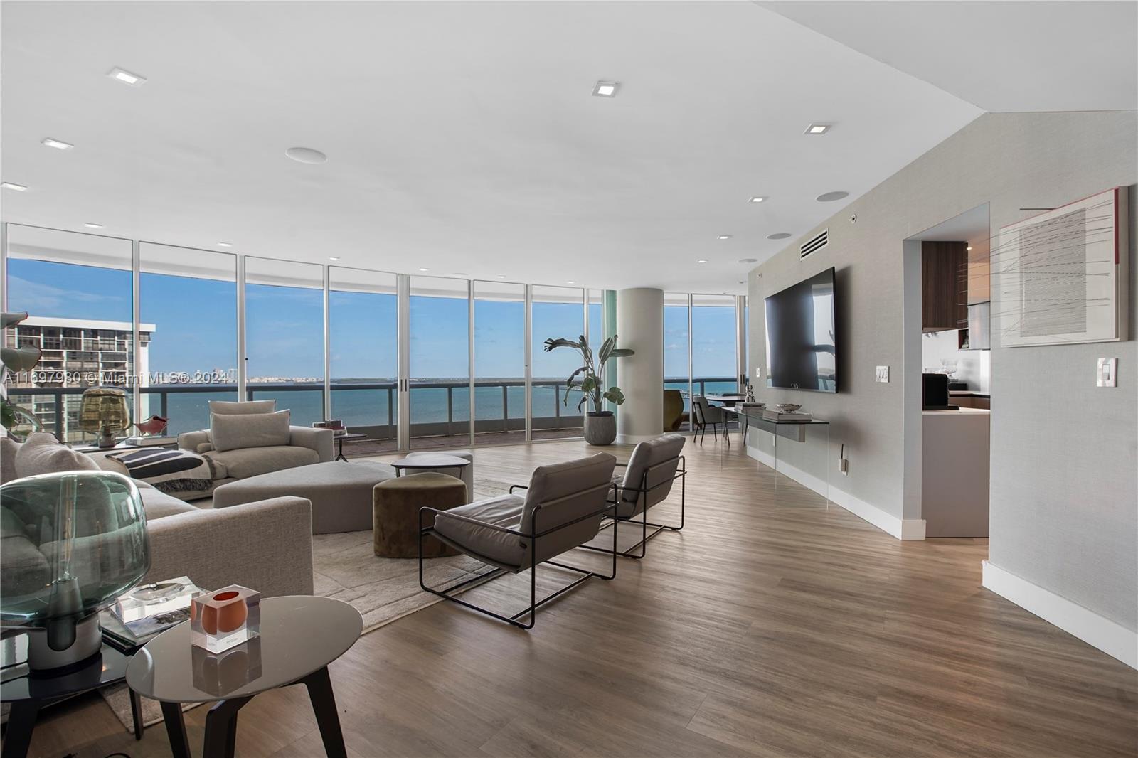 Experience the best of Miami living at 2127 Brickell Avenue. This chic highrise condo, completely remodeled just three years ago, offers a total of 3,655 square feet, including 2,600 square feet of interior space, featuring three bedrooms and three elegantly refurnished bathrooms. Enjoy breathtaking ocean views from your private balcony. Arrive in style with direct access via your private elevator, enhancing the sense of exclusivity. The modern kitchen is equipped with sleek, up-to-date appliances, making meal prep a joy. The building provides an array of luxury amenities, including a doorman, concierge service, tennis court and a gym. Relax at the spa or enjoy outdoor fun at the tennis court and barbecue area. Dive into the ultimate oceanfront lifestyle with this modern Miami gem!