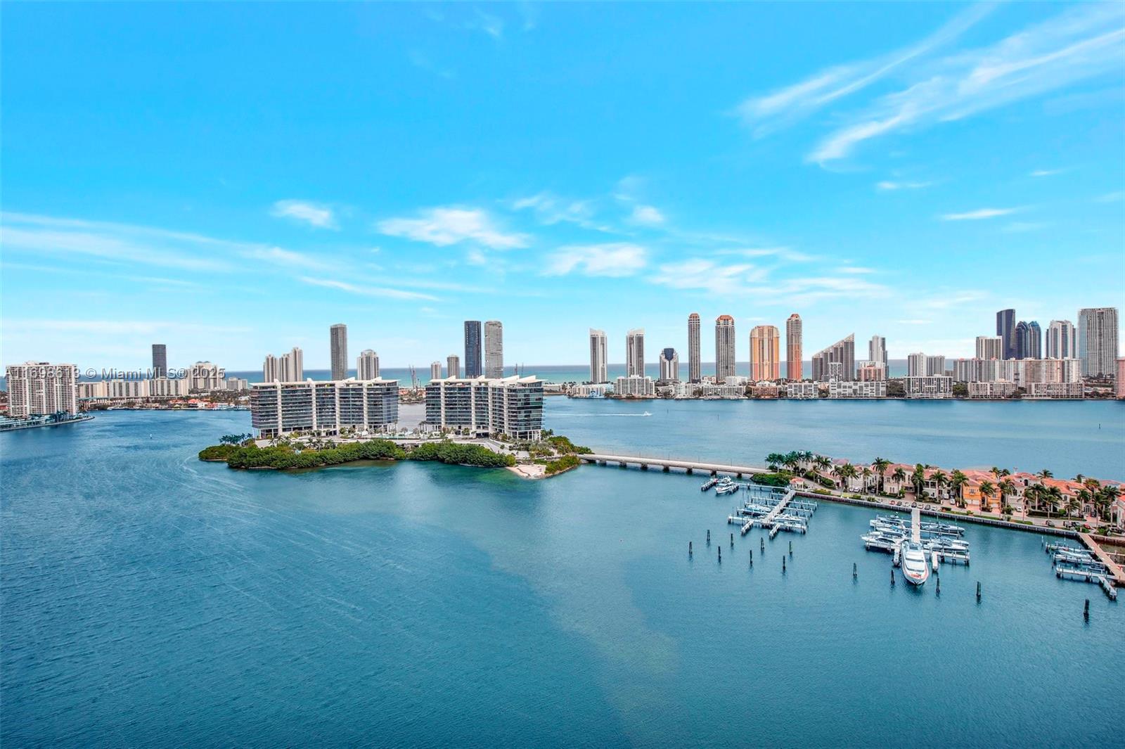 ENTER FROM PRIVATE ELEVATOR FOYER TO THIS SPECTACULAR 3,274 SQ FT RESIDENCE OF 3 BEDROOMS, 3 BATHS, PLUS MEDIA ROOM OR 4TH BEDROOM AND IMMEDIATELY SEE PANORAMIC VIEWS OF THE BAY, INTRACOASTAL, AND OCEAN. THE DESIGNER FINISHES WITH NO EXPENSE SPARED FEATURE: NEW RENOVATED KITCHEN, BATHROOMS, CUSTOM LIGHTING, DESIGNER DOORS, CUSTOM CLOSETS, AND MORE. FLOW THROUGH PLAN OFFERS GREAT VIEWS +LARGE TERRACES FRONT (EAST) & BACK (WEST) - SUNRISE/SUNSET! ENJOY THE FABULOUS PENINSULA LIFESTYLE 5 STAR AMENITIES: CONCIERGE, 2 SPAS/GYMS, NEW CAFE/RESTAURANT, 2 HEATED POOLS W/ATTENDANTS, BBQ AREA, CLUBHOUSE, VALET, 24 HOUR SECURITY, GAME ROOM, KIDS AREA, DOG WALK AREA, BUSINESS CENTER, AND MORE!