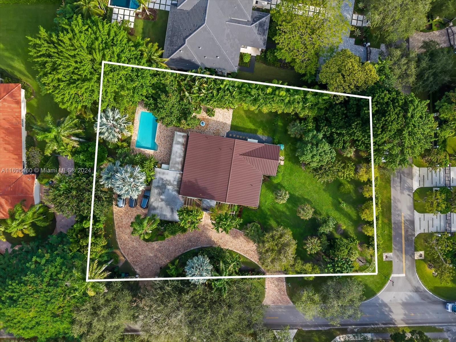 Bring your dream home to life on this nearly 1-acre estate in sought-after northeast Pinecrest! Located on a tranquil, tree-lined street, this property offers endless potential. Surrounded by newly constructed luxury homes, enhancing the appeal of this family-friendly neighborhood. This residence features 5-bedroom, 3-bath home, large bedrooms with ample walk in closets. Large kitchen with a center island is ideal for family gatherings. Elegant travertine floors throughout add timeless sophistication. Bright living spaces that flow seamlessly to the patio and pool is perfect for entertaining. Located in the prestigious Pinecrest Elementary School District and near top-rated schools in Dade County, this property combines an unbeatable location. Don’t miss this exceptional opportunity!