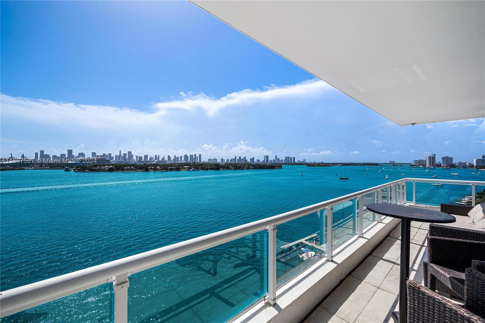 Experience luxury living in this 2-bed, 2-bath corner unit at The Bentley Bay Condo in Miami Beach. Spanning 1,058 sq. ft., this exquisite condo offers a wrap-around balcony with breathtaking views of the bay, ocean, and majestic cruise ships sailing by. The unit features a spacious open-concept design, flooded with natural light through floor-to-ceiling windows that perfectly frame the breathtaking scenery. As a resident of Bentley Bay, you will enjoy exclusive access to world-class amenities, including 24-hour security, valet parking, pool with a lushly landscaped deck, two Jacuzzis, a sauna, and a fitness center. Ideally situated, this location offers easy access to
major roadways, shopping, dining, public parks, and convenient public transportation.