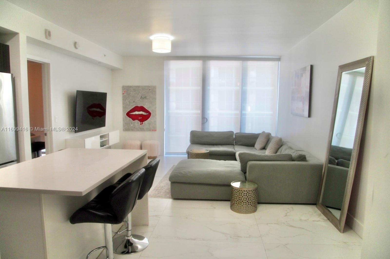 Beautiful fully furnished 1 Bed 1.5 Bathroom unit. Enjoy luxury living just minutes away from Wynwood, The Design District and Downtown Miami. Contemporary elegant design with a large balcony, Italian tile floors, sleek kitchen cabinets and stainless steel appliances. Aria On The Bay offers 24 Hrs Concierge and exceptional amenities like: A Club house, BBQ area, party room, movie theater, kids play room, pool tables, two pools, hot tub, spa, gym, sauna, steam room, business center and more. Motivated landlord and association only takes 2 weeks for approval.