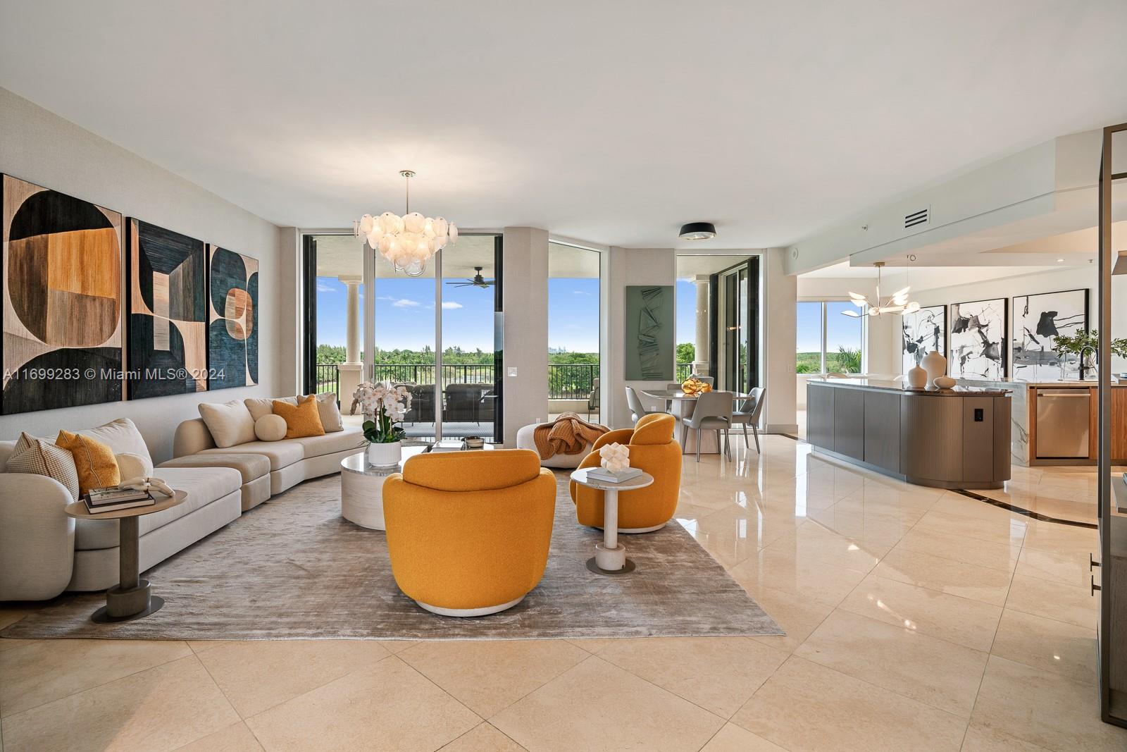 RECENTLY RENOVATED 3 bed 3.5 bath residence by famed interior designer, ADRIANA HOYOS in the exclusive Milano at Deering Bay. A rare gem, this unit boasts high-end finishes, the latest technology appliances and breathtaking views. Enjoy spacious living areas, filled with natural light, and a gourmet open kitchen equipped with stainless steel appliances and granite countertops, a luxurious master suite and two additional bedrooms, each with its own en-suite bathroom. The wraparound terrace provides panoramic golf course and city skyline views, perfect for entertaining or relaxing. Additional features include marble flooring throughout, high ceilings, a separate laundry room, private elevator foyer, private storage unit, two assigned parking spaces and a golf cart space.
