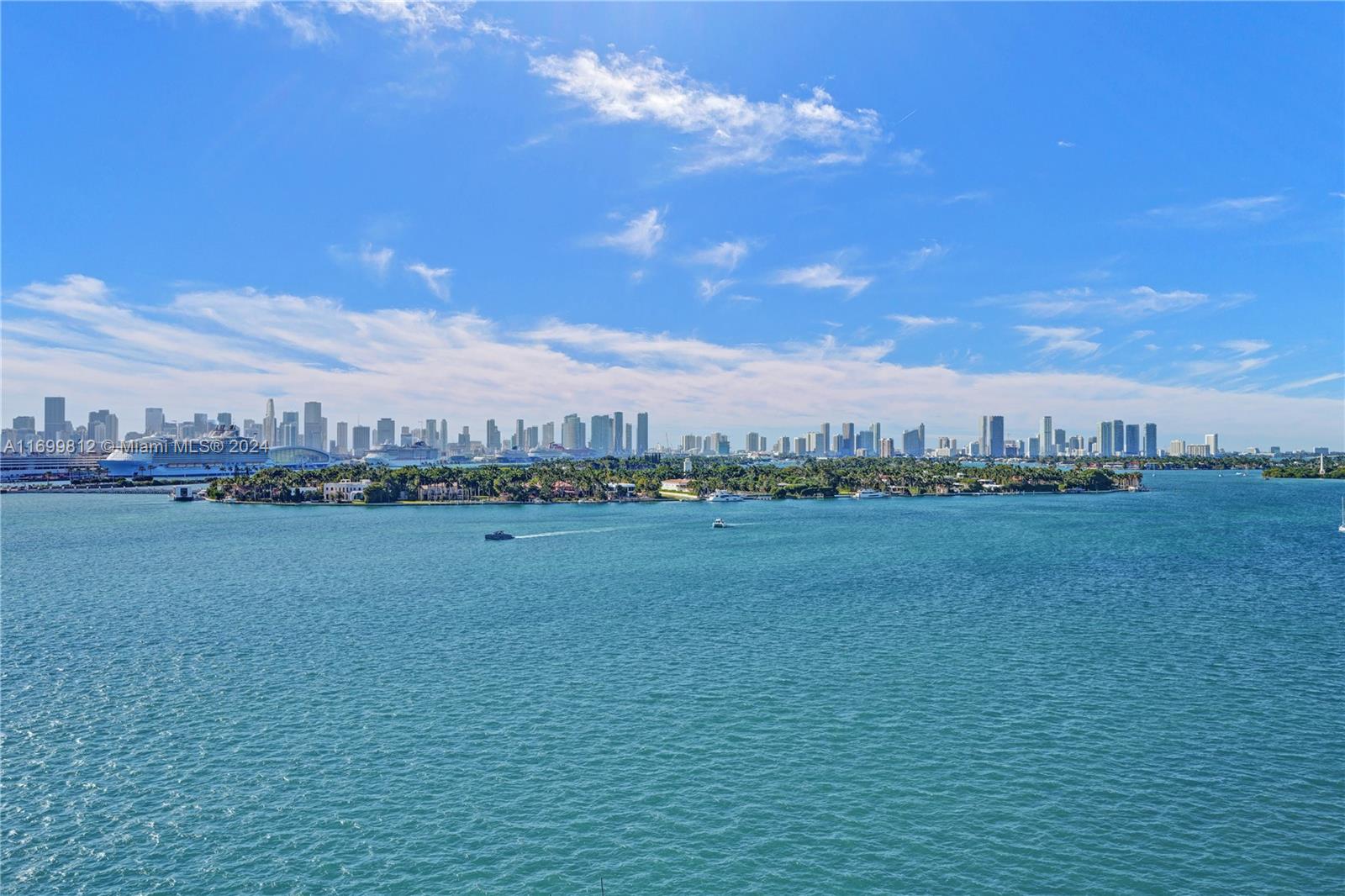 Ultimate luxury spot in South Beach. Experience unmatched luxury!. This rare corner unit at the prestigious Bentley Bay Residences offers unparalleled 120° wraparound views of the ocean and Miami skyline. The unit boasts floor-to-ceiling windows, 9’ ceilings, and a state-of-the-art Crestron system, along with a 160’ screen/projector and advanced smart home integration. Additional features include a marina, 24-hour concierge, and luxurious finishes. The gourmet chef's kitchen has top-of-the-line Gaggenau and Sub-Zero appliances. Enjoy over 1200 sqft of wraparound balconies with direct water views. Exclusive amenities include a private beach, infinity pool, fitness center, and private dock, elevating your living experience. Embrace the pinnacle of coastal lifestyle in Miami Beach.