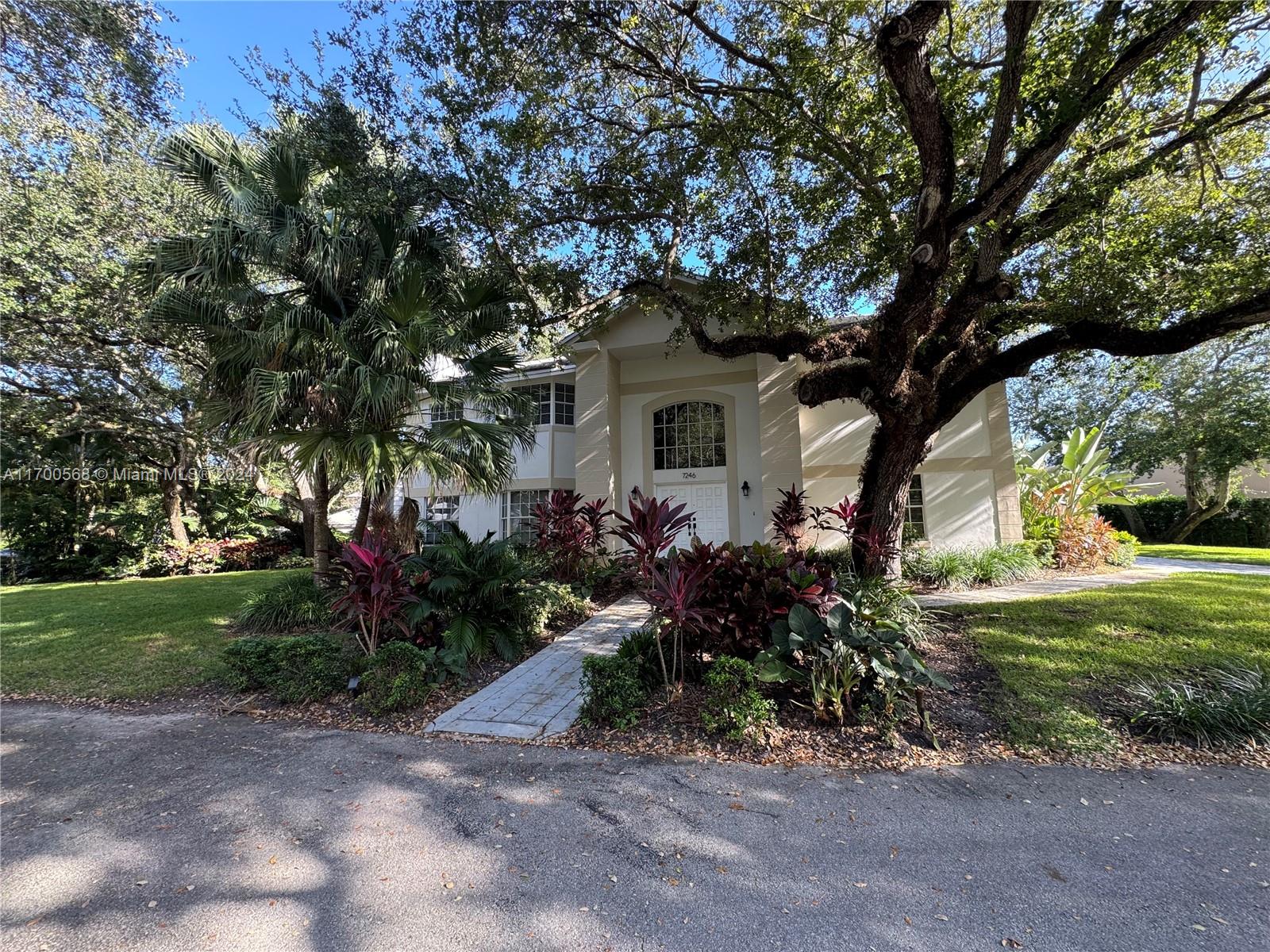 Large and beautiful 2 story home in exclusive gated community of Old Cutler Oaks in Palmetto Bay!! Home is 4,350 Sq.Ft., and it features four bedrooms and three bathrooms, formal dining room and living room, large family room and kitchen with breakfast nook overlooking screened pool and patio; huge master bedroom with fireplace, high ceilings; laundry, 2 car garage, screened pool and more. One bedroom and one bathroom downstairs. Old Cutler Oaks is a beautiful and peaceful community of only 14 homes. Ready to move in. No assoc. approval required.