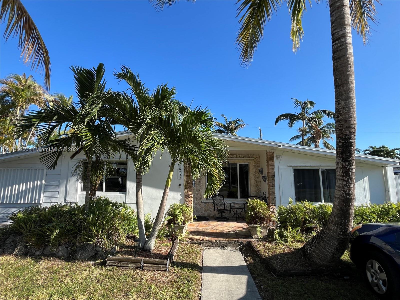 Welcome to 9761 Marlin Rd. This Cutler Bay Gem Larger than tax ROLL! This 4/4  home orig. was a 3/2( w/ a separate rental or mother-in-law zone ) is the perfect starter home or investors paradise! The main house is a 2/2 with a recently renovated open concept kitchen, a 5-year-old roof and A/C, and new appliances. The property highlights two separate in-law quarters. Ideal for multi-generational rental units. A huge lot with a screened in porch and a yard that fits an RV, boat, or a nice pool for entertaining. Great location, close to the expressway, supermarkets, and schools. It's perfect for raising a family or investing in Real Estate. Don't miss this opportunity; it won't