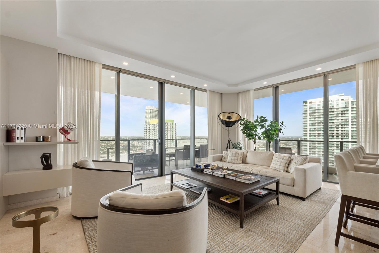 Experience luxury living in this spectacular 3-bedroom, 3.5-bathroom residence at Rise in Brickell City Centre. This fully furnished condo boasts breathtaking panoramic views of the city skyline, river and beyond. Every detail has been meticulously curated, from the high-end finishes to the spacious open layout, creating an inviting and sophisticated atmosphere. This unit features expansive floor-to-ceiling windows that flood the space with natural light, creating a seamless connection between indoor and outdoor living. The kitchen is equipped with top-of-the-line appliances. The balconies are perfect for relaxing or entertaining while soaking in the stunning views of the city. enjoy access to world-class amenities with pool, gym, Direct access to the mall, restaurants and shops.