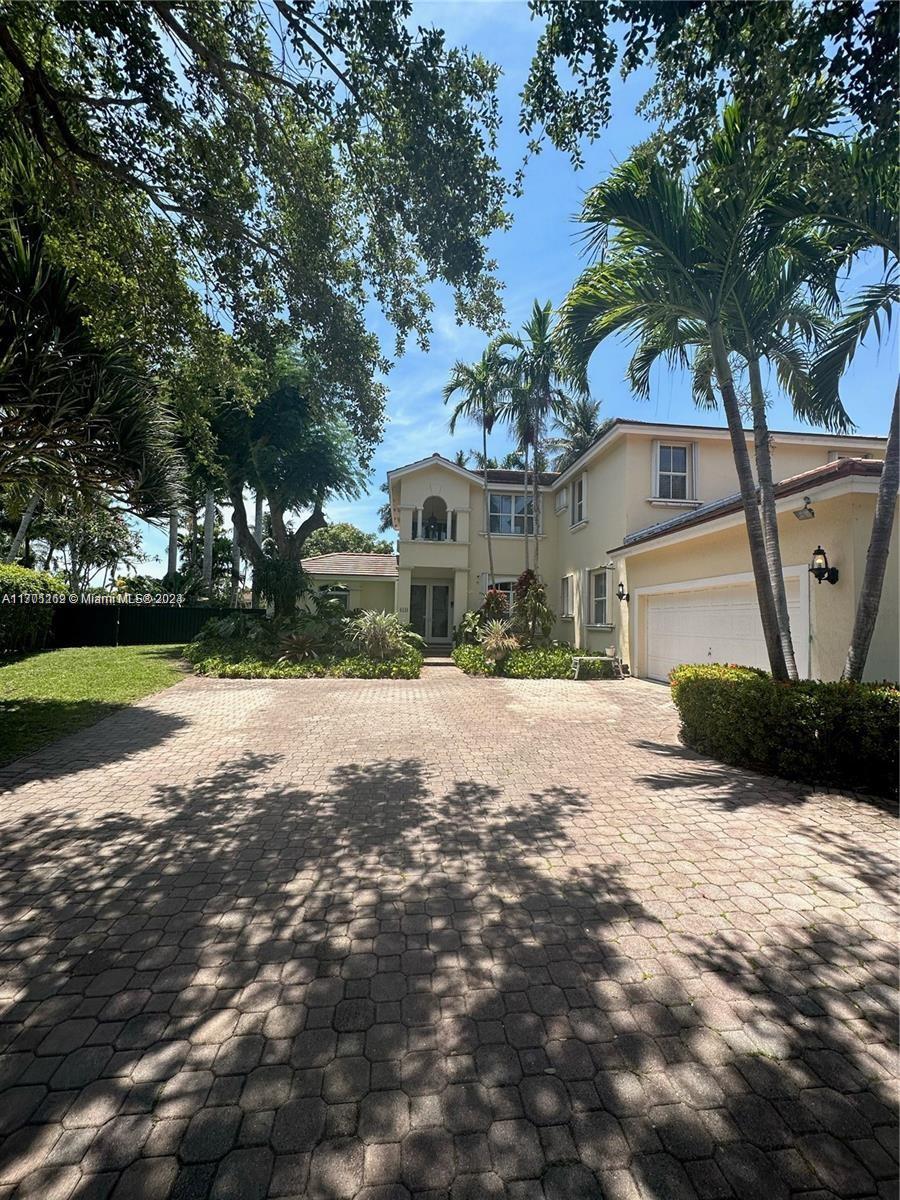 Beautiful and spacious Palmetto Bay pool home tucked away on a private street. This 2 story home with 7 bedrooms and 4 1/2 baths is a rare find. This home was built in 1996 and totally updated. 3 bedrooms downstairs and 4 bedrooms upstairs including large master room with balcony overlooking pool and oversized backyard with fruit trees, tranquil canal, and greenbelt. Great schools (elementary to high schools), safe, quiet, and nice neighbourhood. Close to Coral Reef Park, Deering estate, and shopping centers. Smoking is not allowed. The property is furnished (with flexibility), and rent include pool and lawn maintenance. A true paradise to discover and enjoy! Don't miss it!