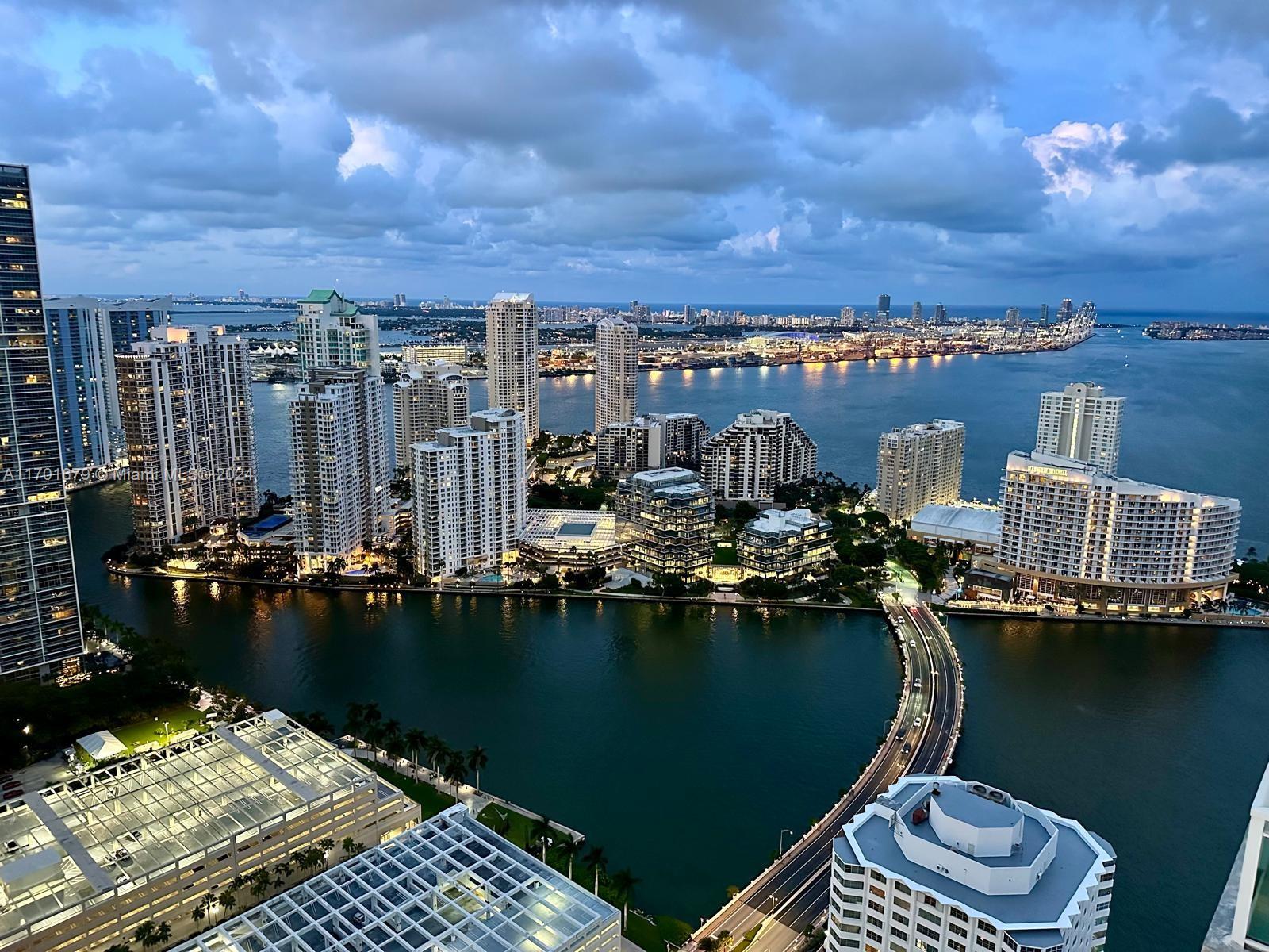 Experience luxury living in this stunning 2-bedroom, 2-bathroom sky-high retreat, breathtaking water/city views from the 48th floor. Nestled in the heart of Brickell, it is a walker's paradise: Brickell City Center (5 MIN WALK), banks (2MIN), restaurants (3 downstairs), 5 MIN walk to the Brickell attractions, and Brickell Key walk path. Revel in the elegance of higher ceilings and upgraded stainless steel appliances, stackable washer and dryer, complemented by chic wood flooring throughout. Unparalleled amenities including 2 pools, jacuzzi, Zen Garden, rejuvenating spa, state-of-the-art gym, relaxing sauna, a theater, a fully-equipped business center and children's room. Assigned parking. UNIT REPAINTED, MINT CONDITION. Unit is for sale. Easy show! 1st, last and deposit.