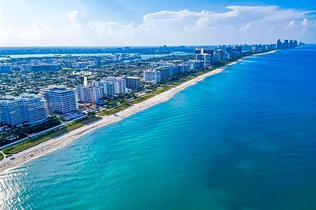 Carlisle on the Ocean has beach access and this PH corner residence has a  balcony facing south that allows ocean views and the warmth of the sun during the day and the unobstructed fabulous views of the Miami Skyline and the colorful display of  beautiful sunsets at night. Residents may enjoy amenities to include a swimming pool, a fitness center, a garden and a barbecue grill. Airbnb friendly building.
The location could not be better! It is located right next to the Four Seasons Residences and in its immediate surrounding residents will find the Surfside Tennis Center, the Community Club House with two swimming pools and social rooms. Only blocks away residents will  find stores, banks and restaurants in the Surfside Shopping District and will enjoy the world-famous Bal Harbour Shops.