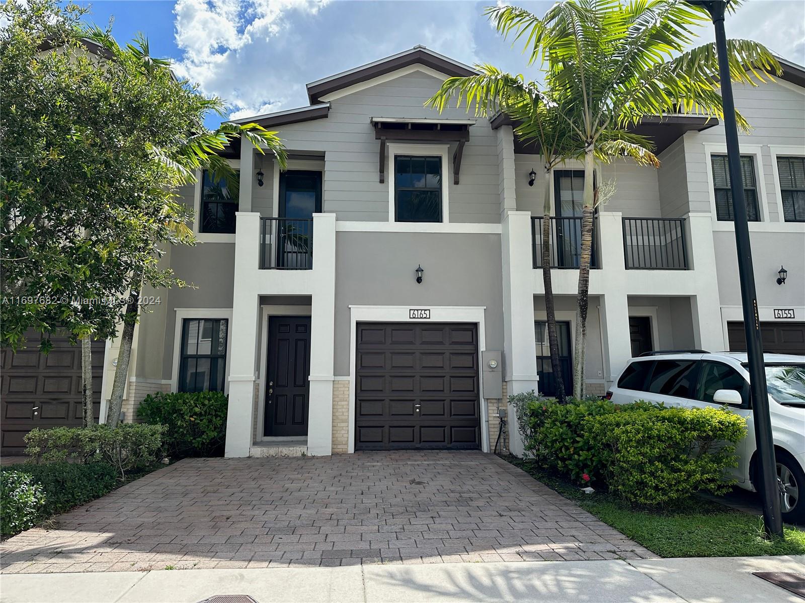 Charming 3-bedroom, 2.5-bathroom townhouse in the gated community of Doral Cay. This home offers a comfortable living space, featuring a 1-car garage and room for 2 additional cars in the driveway. Convenient second-floor washer and dryer plus den space. Enjoy the perks of a secure neighborhood with a 24-hour security guard, parking, and a refreshing pool. Located just minutes away from Downtown Doral, this townhouse offers easy access to major expressways and is surrounded by shopping and fine dining options. Your ideal blend of comfort and convenience awaits in this Doral gem.