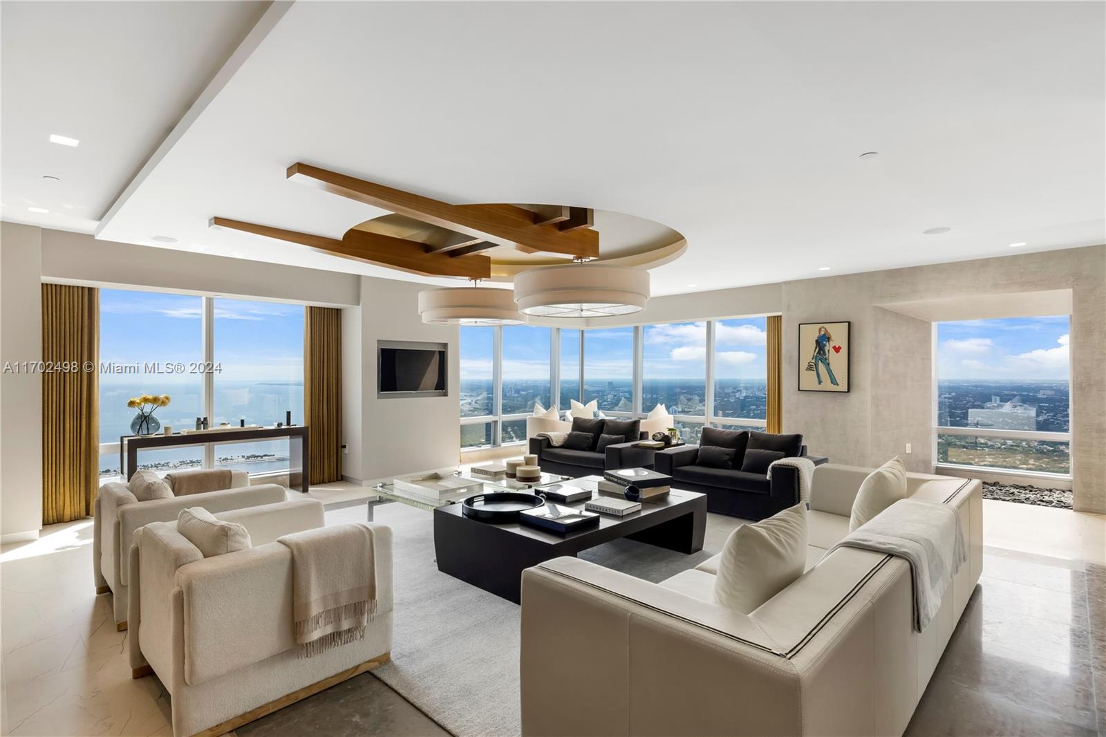 Breathtaking unobstructed views of the ocean, bay and Miami Skyline from this one-of-a-kind PH at the Four Seasons in Downtown Brickell.  Spectacular home comprised of four seamlessly combined units.   Grand private foyer entrance into an open living space that offers breathtaking stunning sunrises and sunsets through its floor-to-ceiling windows. Private movie theatre, a state-of-the-art chef’s kitchen, beautiful wine cellar and custom home offices. Sold fully furnished and move-in ready. Located at the Four Seasons Residences, one of the tallest and most prestigious buildings in Brickell. Enjoy world-class amenities,  multiple pools, a fitness center, a spa, and concierge services. The home includes four reserved parking spaces with valet services available for guests.