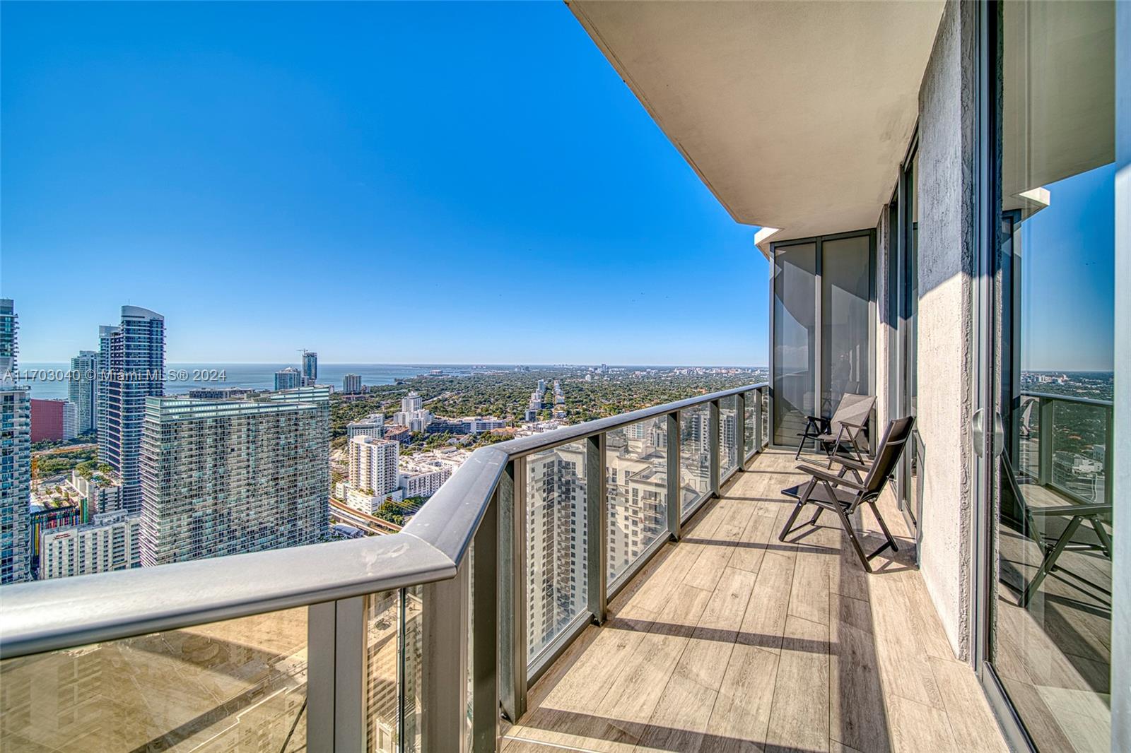 Experience the ultimate in luxury living at this spectacular Lower Penthouse in Brickell Heights East Tower! This vibrant residence boasts 3 lavish bedrooms, a versatile convertible den, and 4 full bathrooms. Be dazzled by panoramic views of Biscayne Bay and the glittering Miami skyline through expansive floor-to-ceiling windows. Soaring 12-foot ceilings amplify the spaciousness, while the generous balcony offers a stunning backdrop for entertaining or relaxing. The second bedroom serves as an additional en-suite—perfect for guests or family. Enjoy effortless parking with 2 assigned spots and 1 valet space. Just steps from Brickell City Centre, immerse yourself in Miami’s finest shopping, dining, and entertainment.