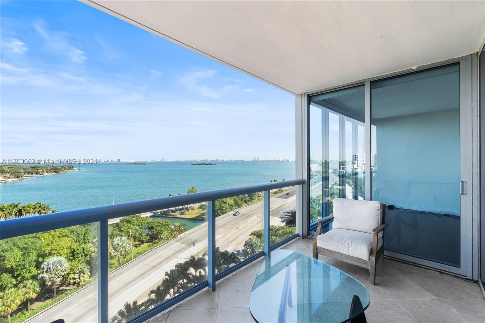 Look no further, your home on the water awaits. Beautiful views of the Biscayne Bay and Miami Beach. One of the most desired lines in the building, floor to ceiling glass windows which allow for sunlight all day. This unit has one assigned parking space and one valet parking space along with one storage space. Beautiful kitchen with walk in closets and cabinetry throughout. The building has fabulous amenities including 2 separate heated pools, jacuzzi, spa, cycling room, party room, huge gym, business center, movie theatre, kids playroom, BBQ, 24/7 concierge. Located in the heart of Miami walking distance to the Design District, minutes to Wynwood, Miami Beach, Brickell, and Miami International Airport. Unit is vacant and ready for move in.