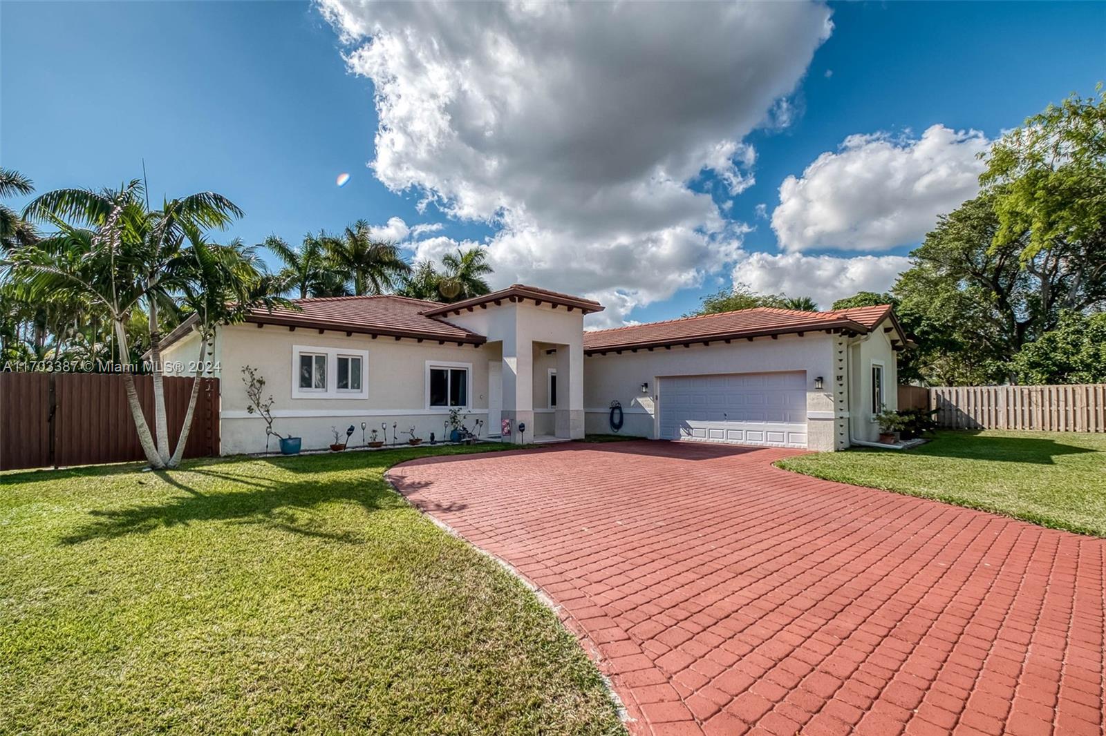 Fantastic 2016-built, 4 bdrm, 3.5 bath home located on a half-acre lot on a quiet cul-de-sac in North Cutler Bay. Formal living & dining rms. Open kitchen features large center island w/ sink & seating, butler’s pantry/coffee bar could be used as a breakfast nook, all adjacent to family rm w/ half bath perfect for guests. Private primary suite w/ large bath & walk-in closet. Ideal yard for entertaining; coral patio, gazebo for summer kitchen, covered terrace & sparkling heated swimming pool w/ lap lane, beach entry/tanning area, hot tub & space for the kids to play. Fenced backyard w/ mango trees, double gate w/ room to park a boat. Impact windows/doors. Indoor laundry rm. Paver driveway. 2 car garage.