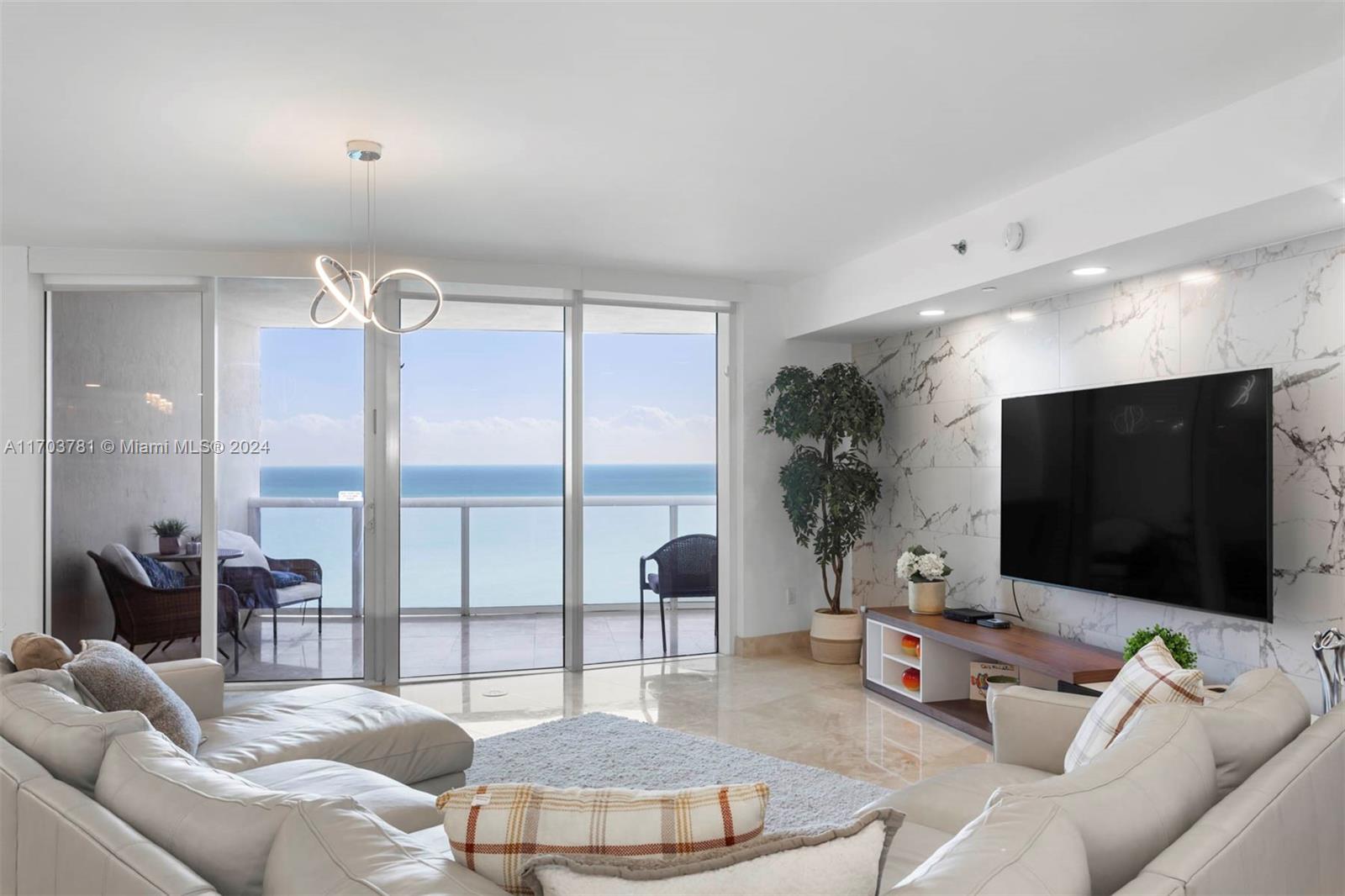 Experience luxurious living in this stunning oceanfront building. This beautifully designed 2-bedroom, 2.5-bathroom residence also includes a den that can easily serve as a third bedroom. Enjoy breathtaking ocean and city views from every room. 
Building amenities include a refreshing pool, sauna, jacuzzi, 24-hour security, and valet service. For your convenience, there’s also a restaurant located right on the beach. This is the perfect place to indulge in both comfort and style for a six-month stay.
Available now for 6-month rental. Don't miss out on this incredible opportunity!