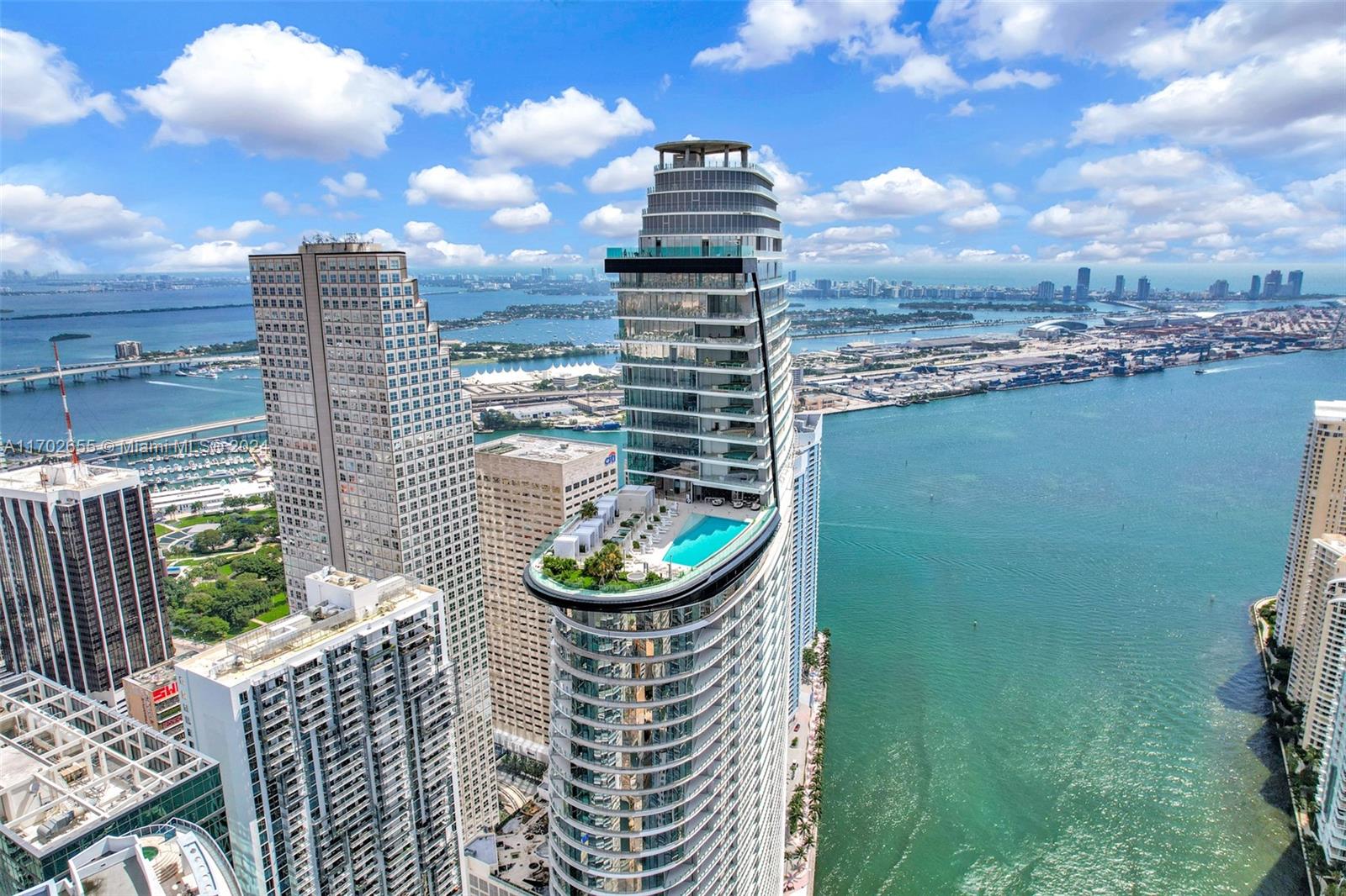 Indulge in unparalleled luxury at this beautifully Furnished 2-bedroom + DEN Sky Residence at the prestigious Aston Martin Residences. Perched on the 49th floor, this 1,578 sq. ft. unit boasts breathtaking views of Downtown Miami's dynamic skyline, framed by neighboring architectural landmarks. Includes a storage space. Designed with a sophisticated split floor plan, this residence combines elegance and functionality. Immerse yourself in over 42,000 sq. ft. of world-class amenities, including a 55th-floor infinity pool with panoramic vistas, a state-of-the-art fitness center, serene spa facilities, an art gallery, two private movie theaters, a golf simulator, a grand community room, a kids' playroom, a billiards lounge, and access to the exclusive Aston Martin DBX house car.