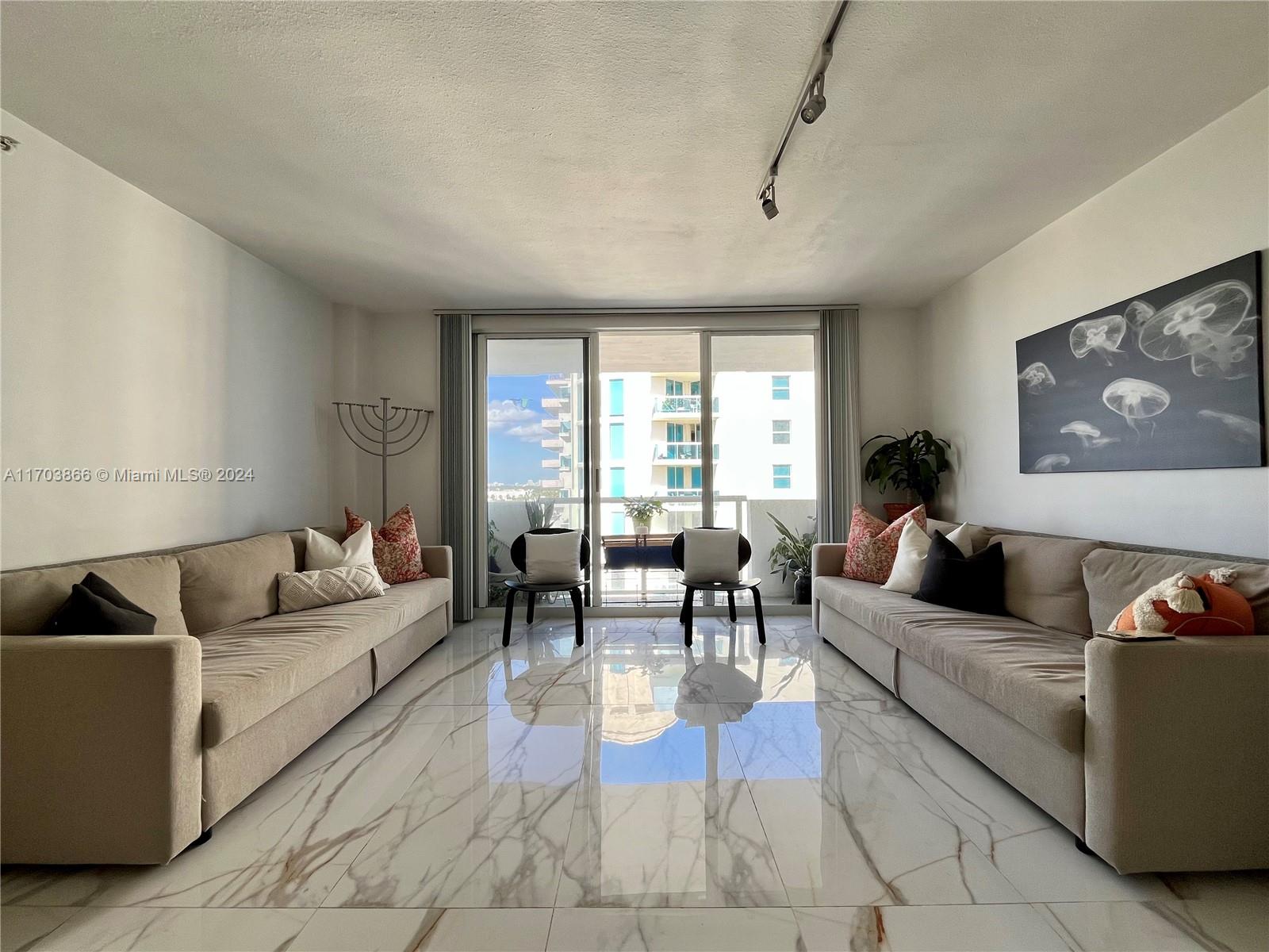 This fully renovated 1-bedroom condo offers the ultimate beachfront lifestyle, perfect as a vacation home, primary residence, or investment opportunity.
The unit features an open kitchen, marble flooring, impact windows, and a lot of natural light throughout the apartment.
Enjoy direct access to white sand beaches, a walking path, and a bike trail. Located next to the Four Seasons, and within walking distance to Bal Harbour Shops, luxury dining, and A-rates schools.
This condo has one of the lowest HOA fees on the beach and features a beachfront pool, a gym with ocean views, a BBQ area, garage parking, and more. 
Recently completed 40-year recertification. Offered furnished or unfurnished.