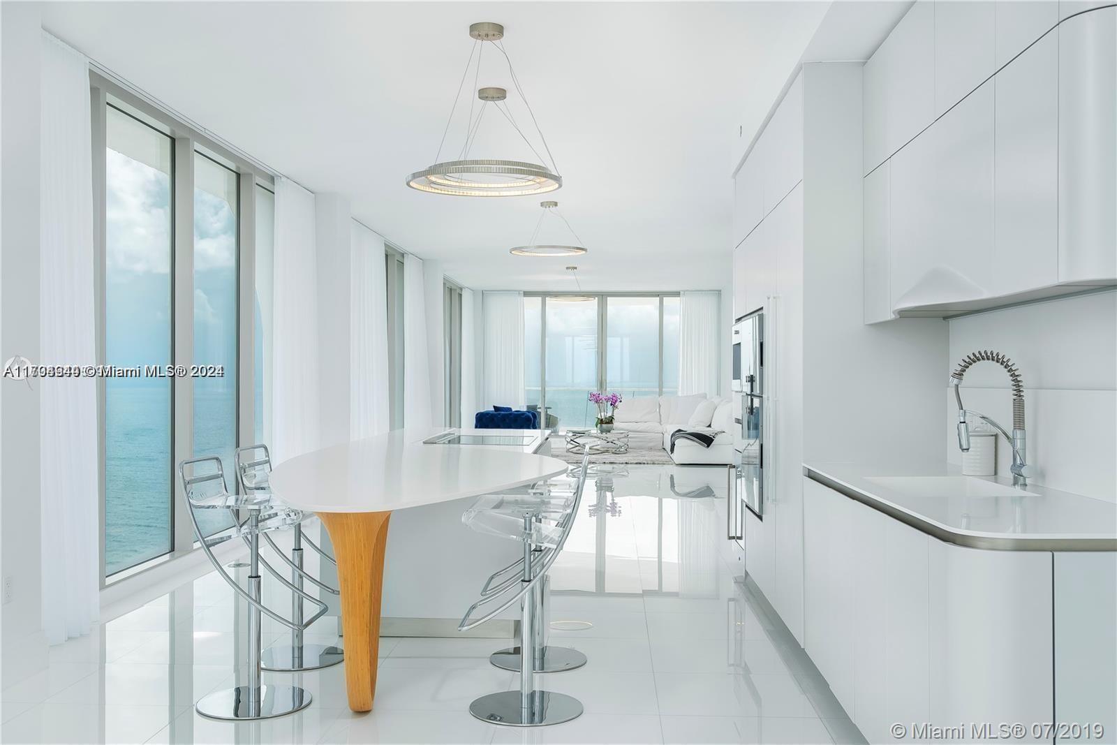 Unit is fully renovated!!! Experience luxury in this 4-bedroom, 5.5-bathroom unit on the 19th floor of the iconic Jade Signature, Sunny Isles. Spacious and bright with marble flooring throughout, each room offers private balcony access. Enjoy breathtaking ocean and city views from floor-to-ceiling windows. The designer kitchen is draped with Snaidero cabinetry and top-of-the-line appliances inclusive of a wine cooler, cappuccino maker, and speed oven. Building offers three levels of amenities that include multiple pools, a state-of-the-art health and wellness center, spa, kids room, wine bar, & much more. Located in the heart of Sunny Isles, this residence is just steps away from fine dining, shopping, and entertainment